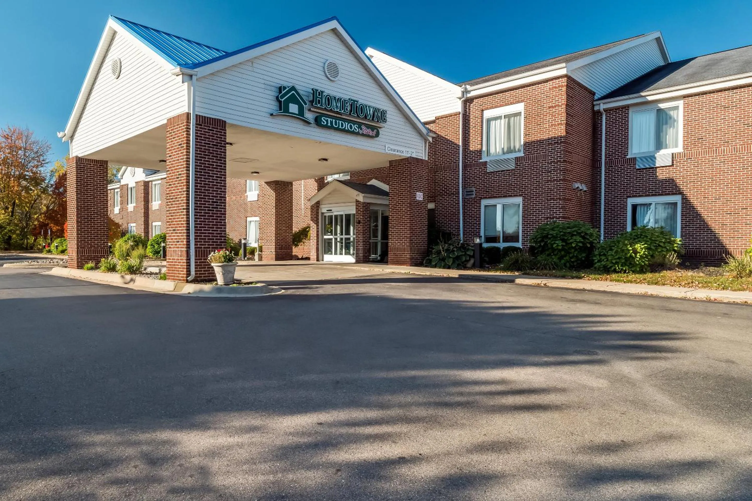 Property building in HomeTowne Studios by Red Roof East Lansing - Okemos