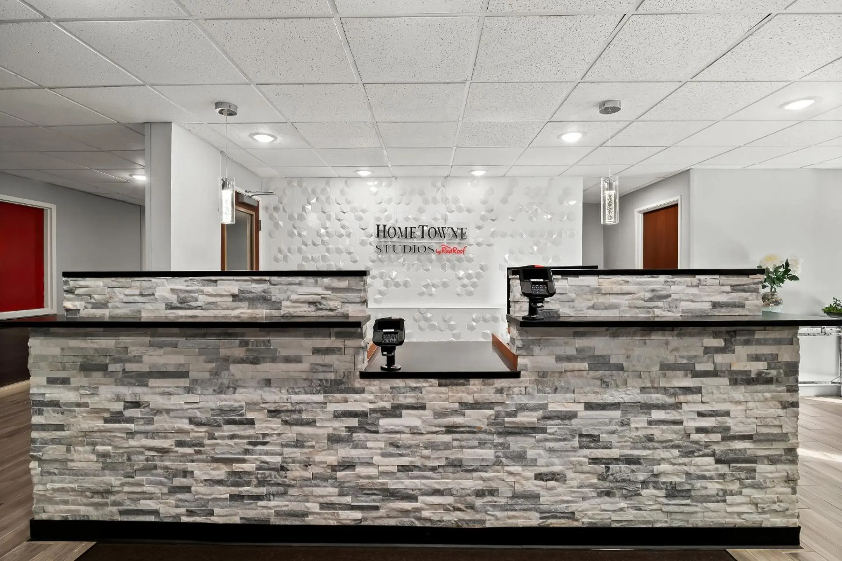 Lobby or reception in HomeTowne Studios by Red Roof East Lansing - Okemos Lobby or reception in HomeTowne Studios by Red Roof East Lansing - Okemos