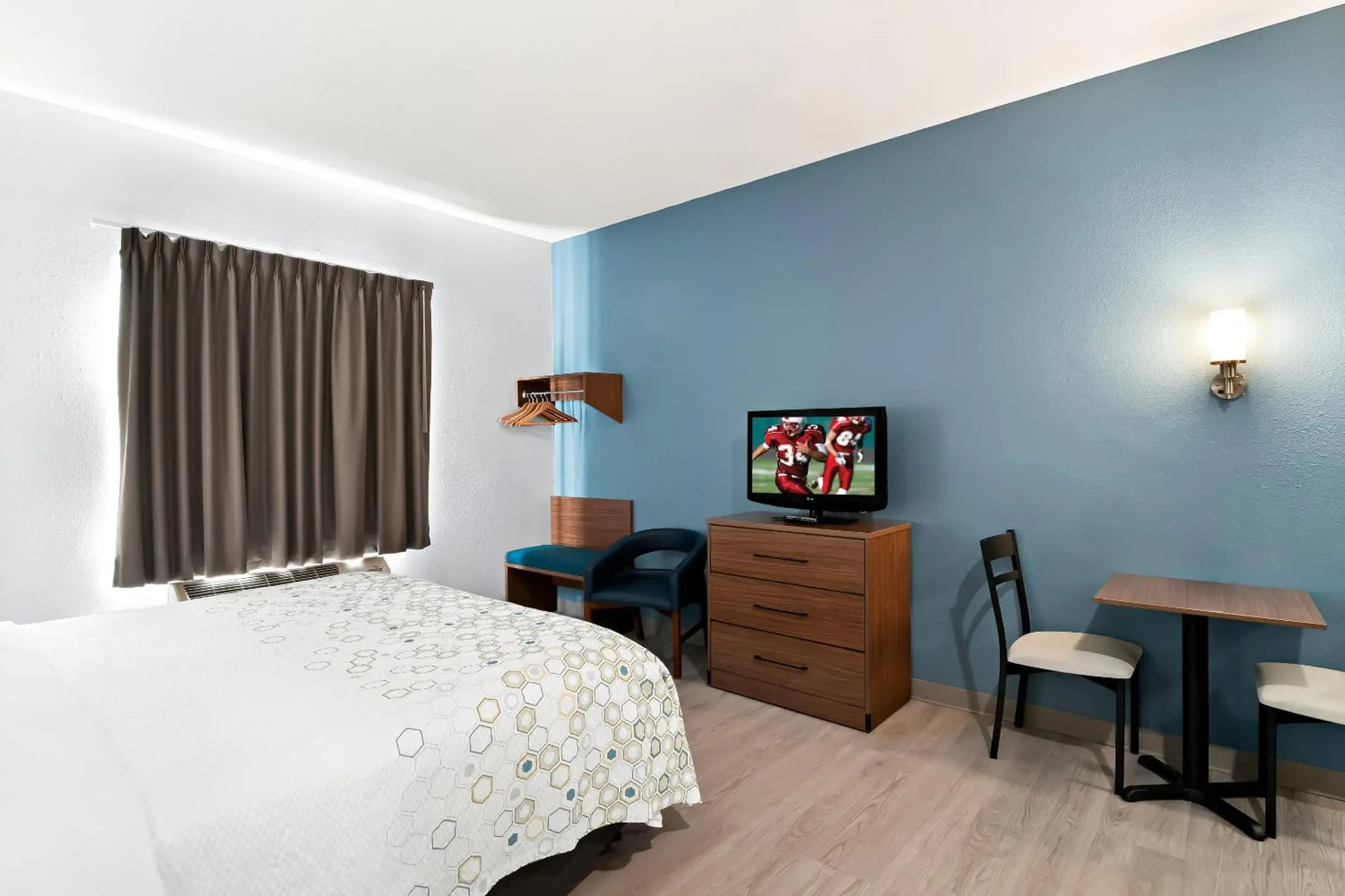 Photo of the whole room, Bed in HomeTowne Studios by Red Roof East Lansing - Okemos Photo of the whole room, Bed in HomeTowne Studios by Red Roof East Lansing - Okemos