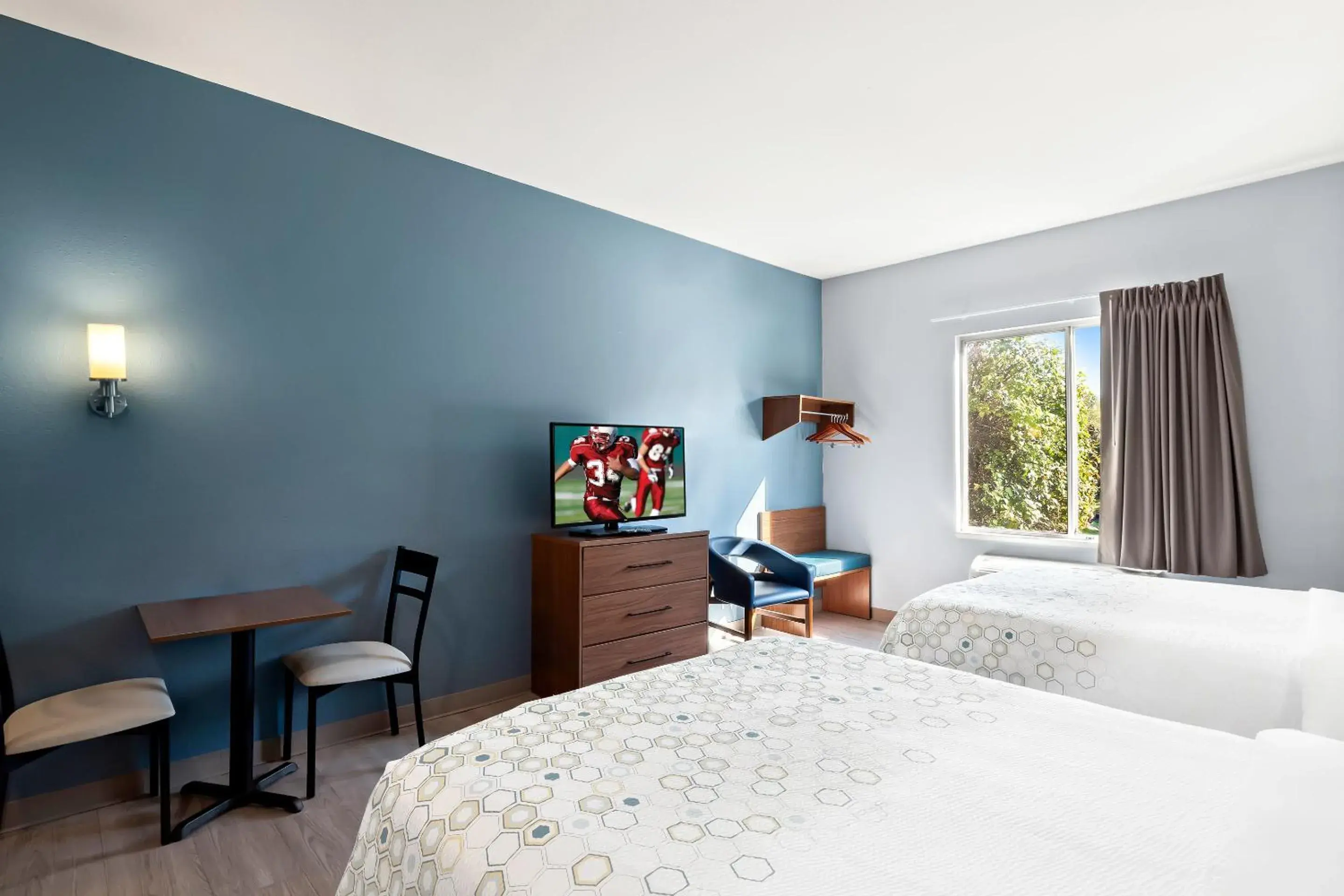 Photo of the whole room, Bed in HomeTowne Studios by Red Roof East Lansing - Okemos Photo of the whole room, Bed in HomeTowne Studios by Red Roof East Lansing - Okemos