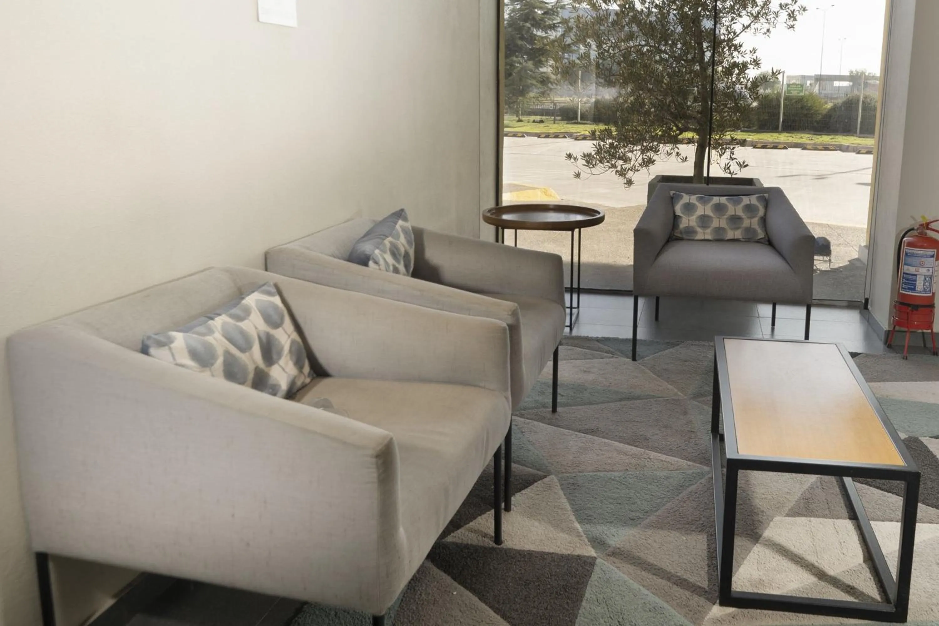 Living room in City Express by Marriott Santiago Aeropuerto