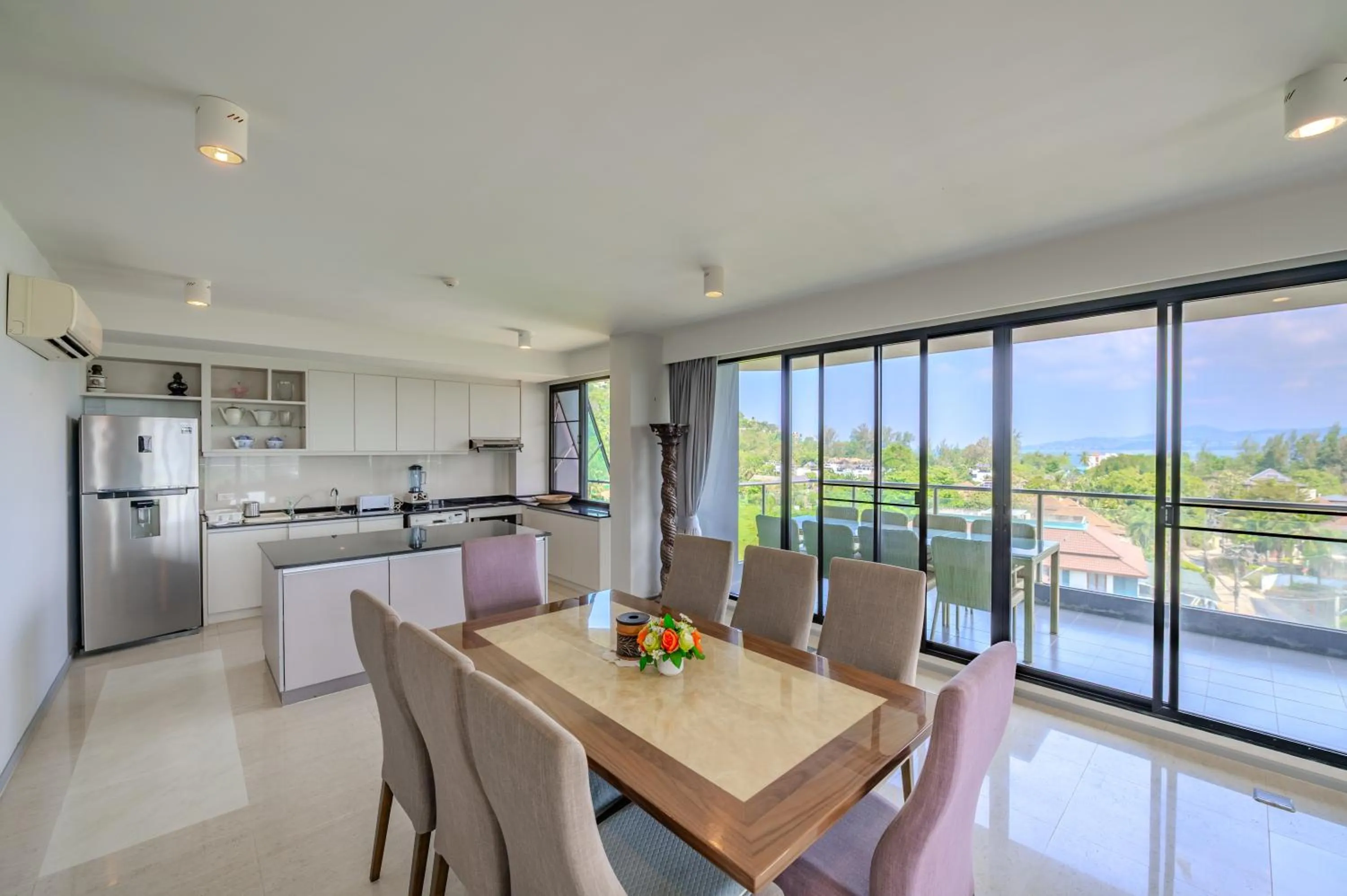 Dining area in 6th Avenue Surin Beach - Official Account