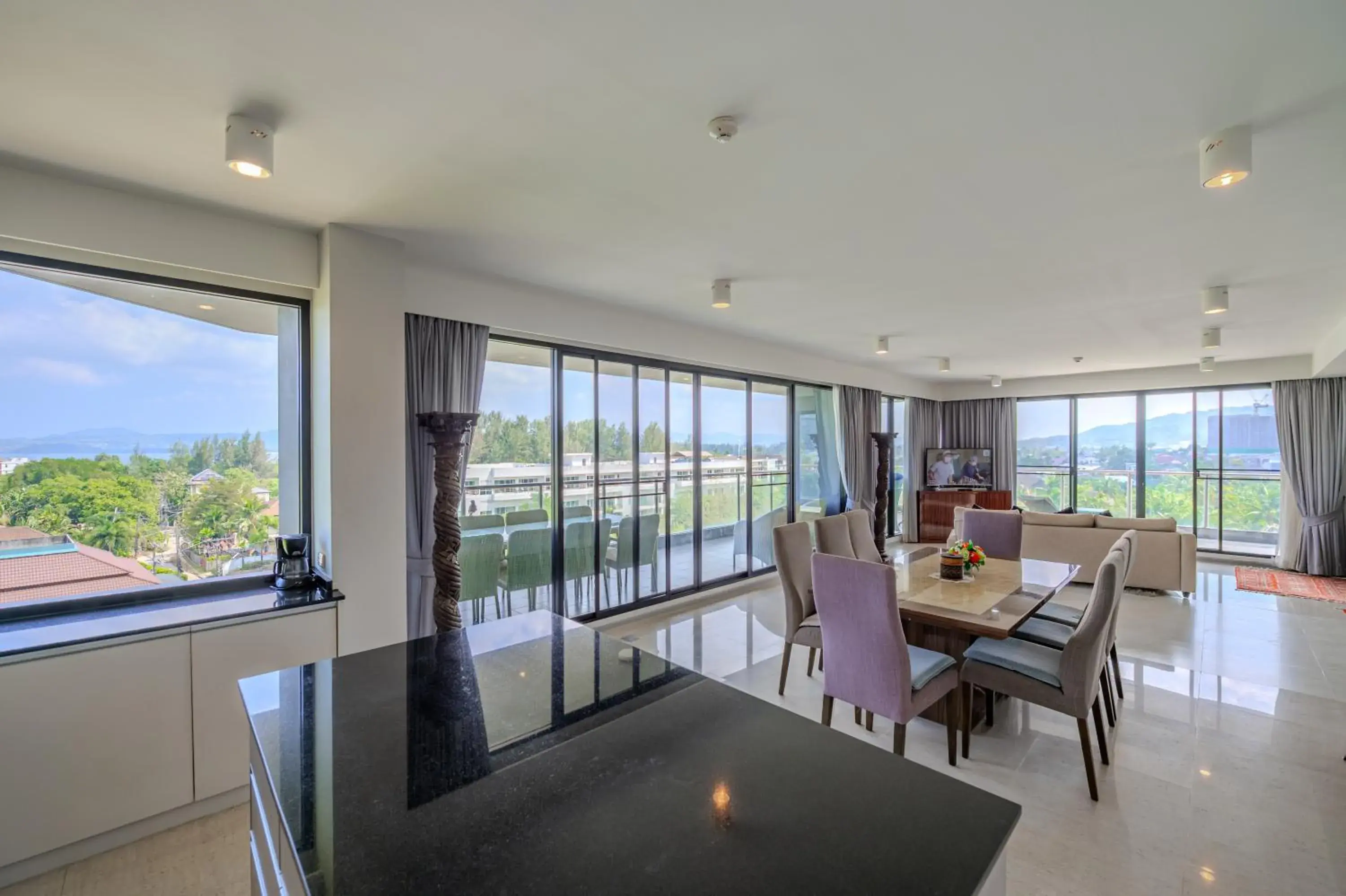 Living room in 6th Avenue Surin Beach - Official Account Living room in 6th Avenue Surin Beach - Official Account