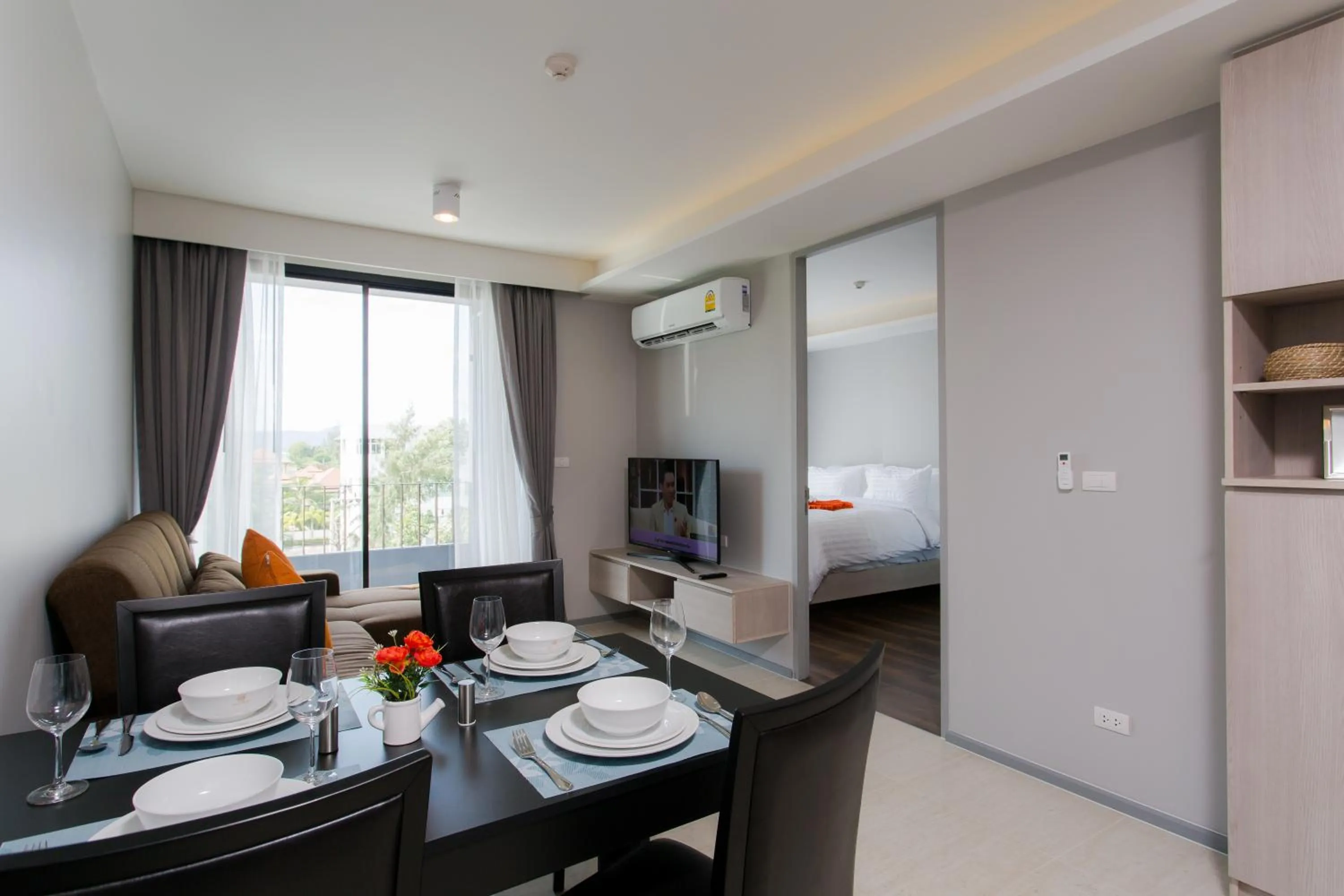 Dining area in 6th Avenue Surin Beach - Official Account