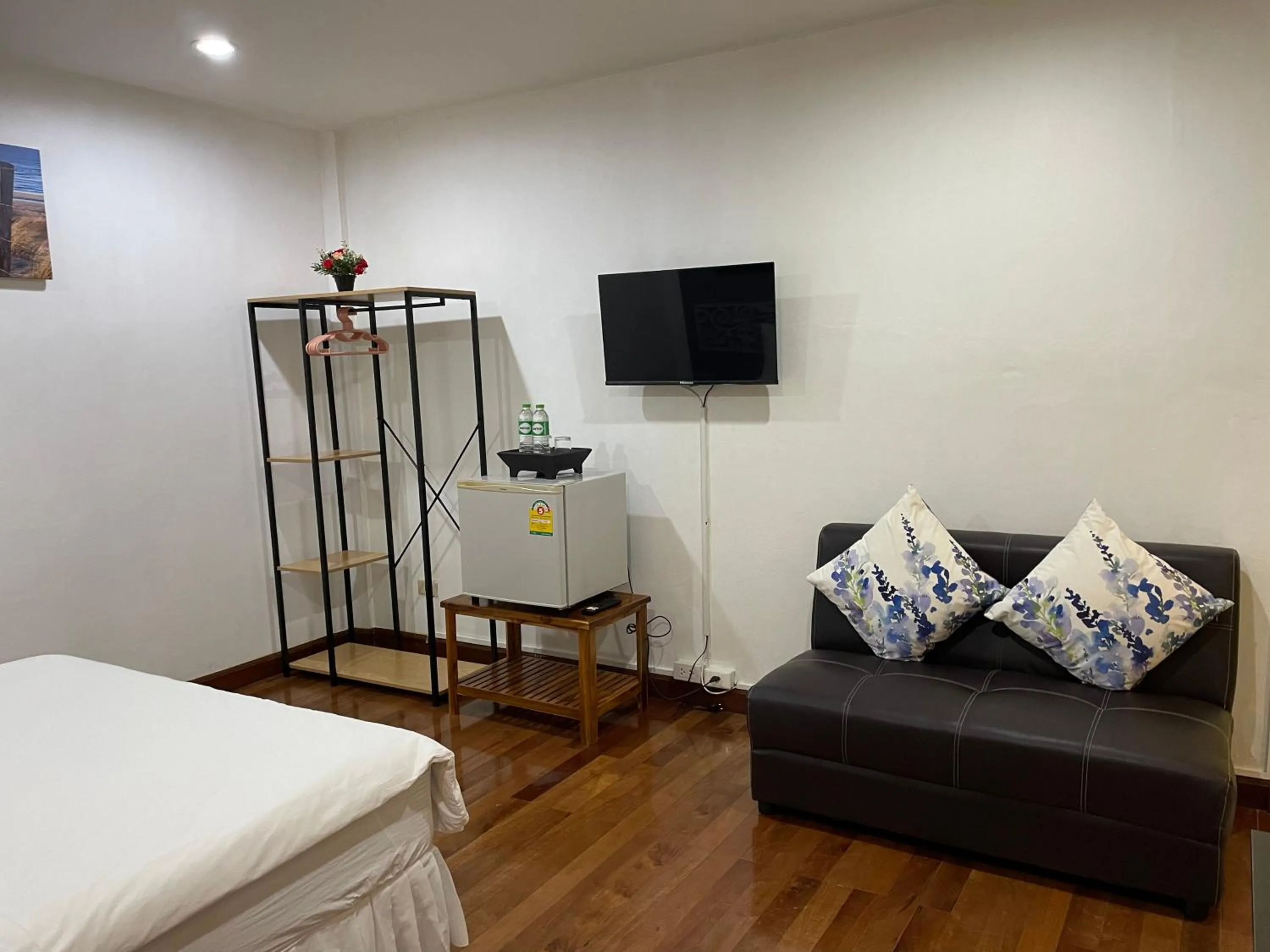 Seating area, Bed in Nawaporn Place