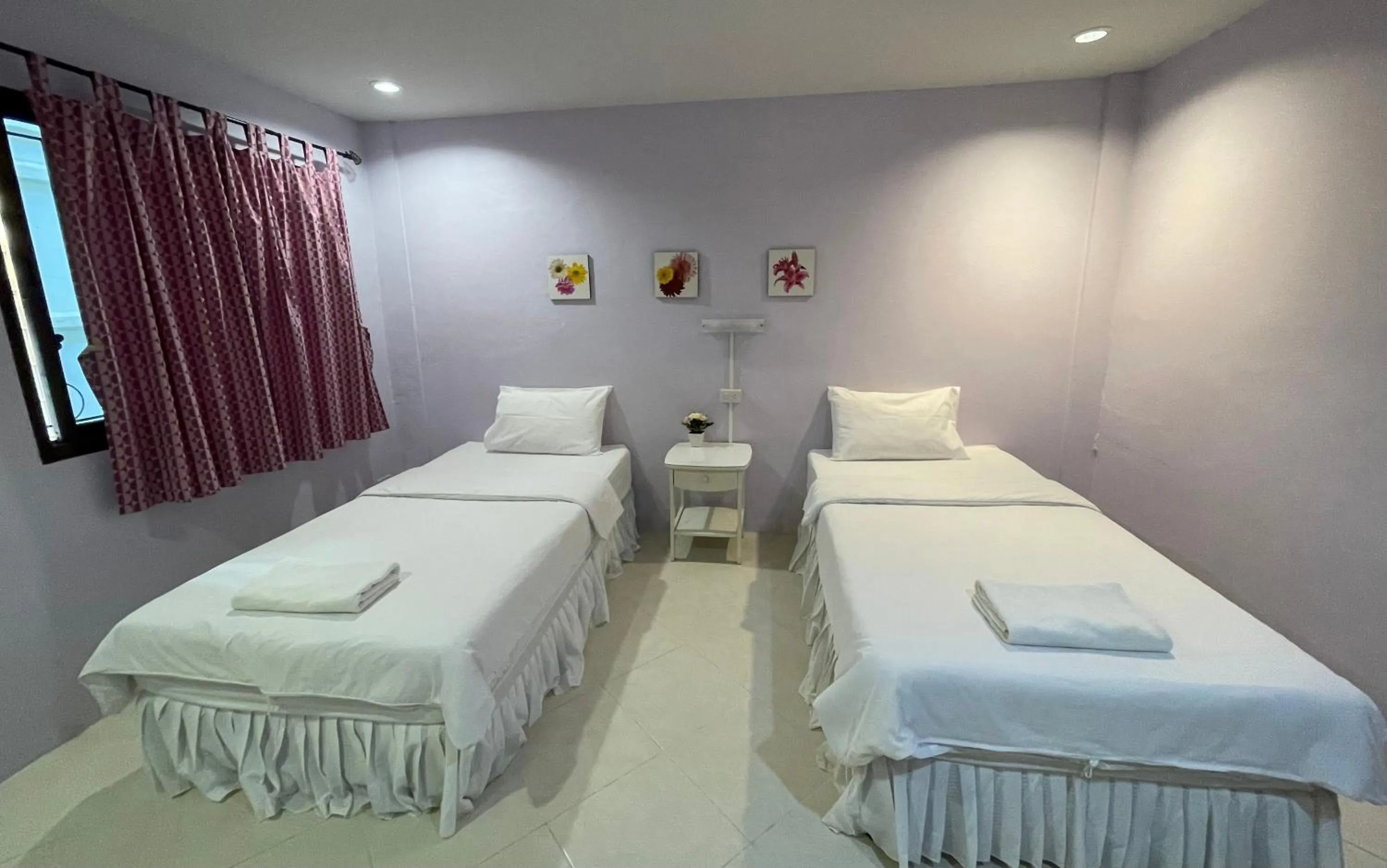 Bed in Nawaporn Place