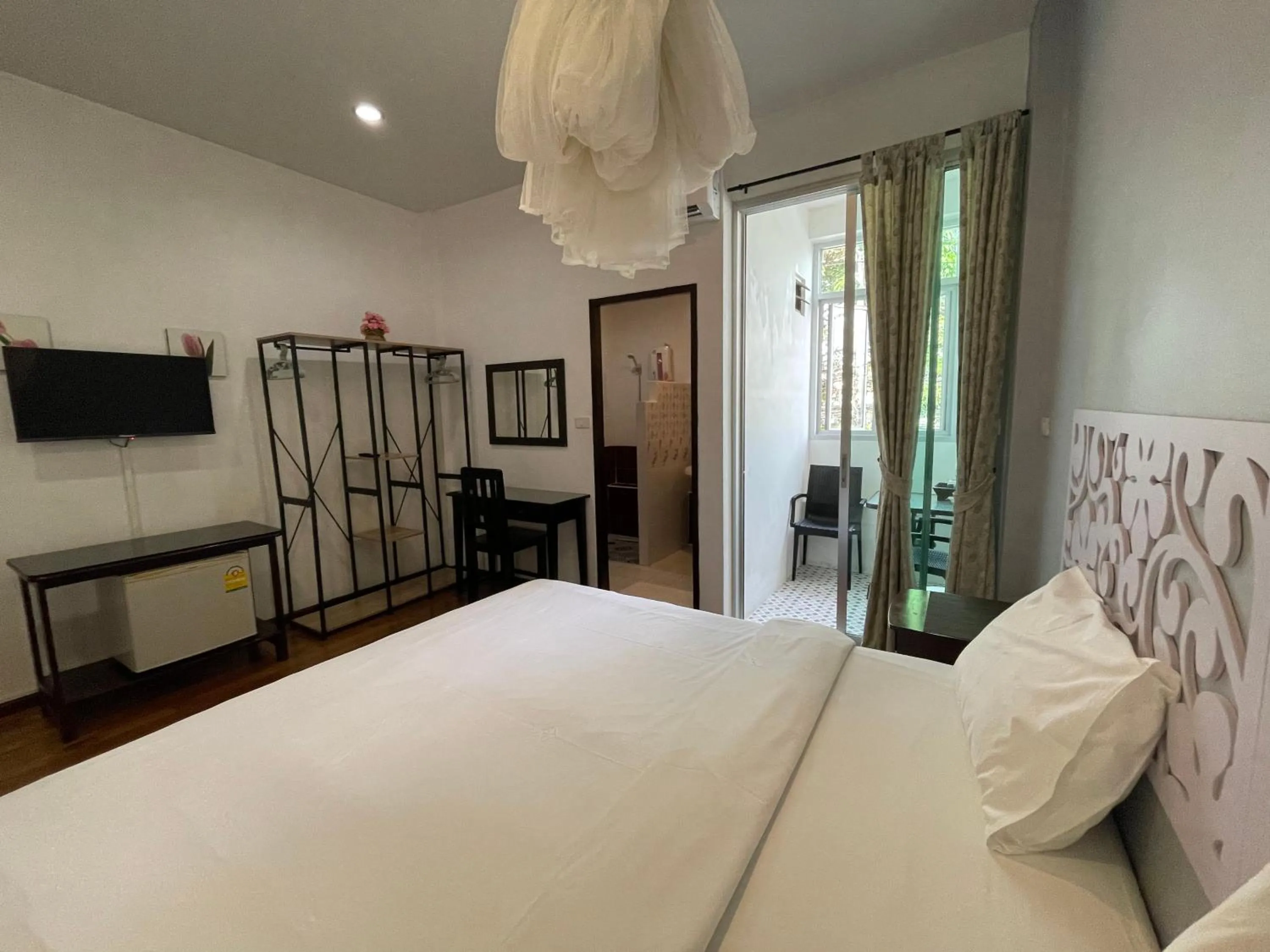 Photo of the whole room, Bed in Nawaporn Place