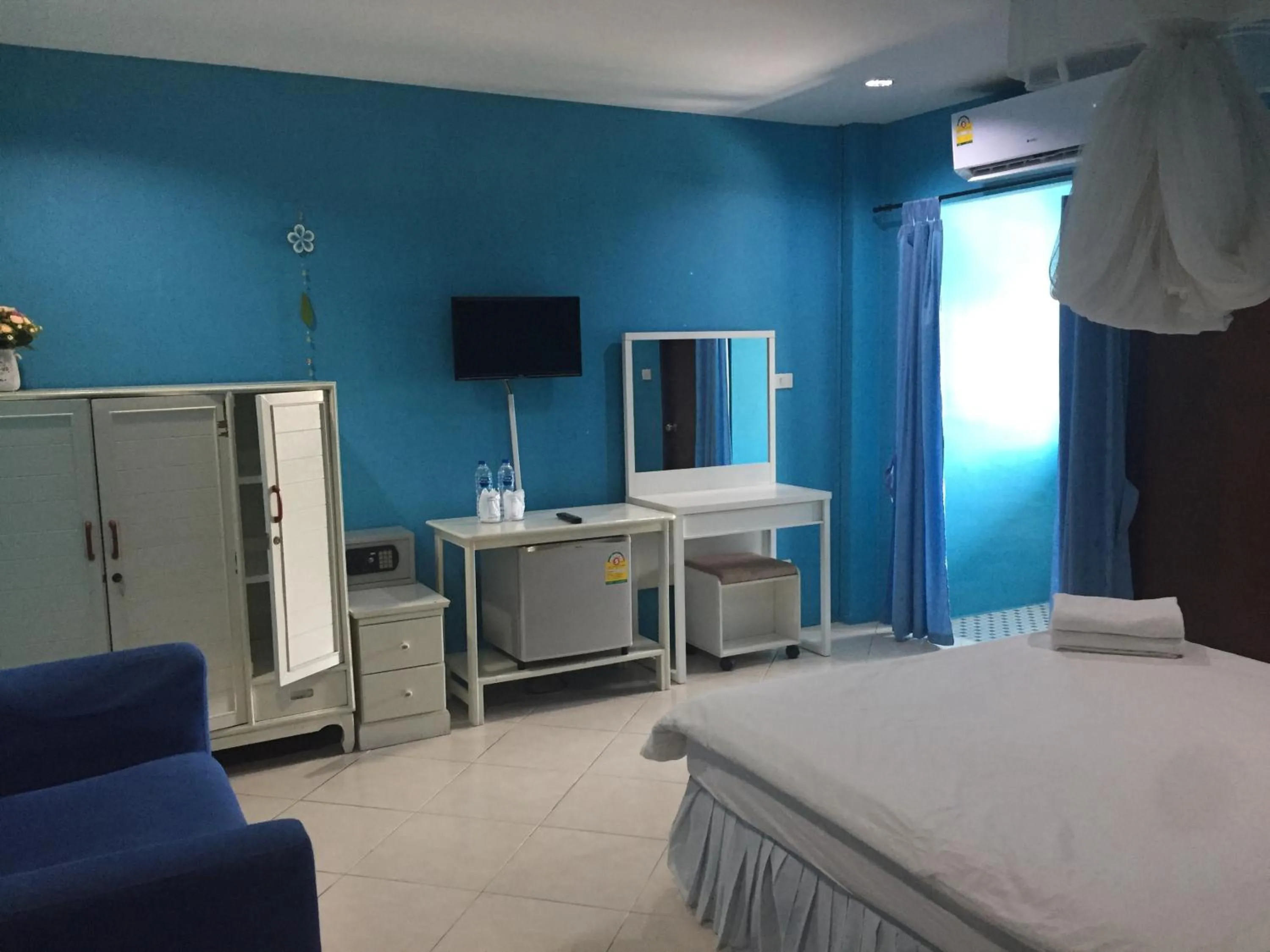 Bed in Nawaporn Place