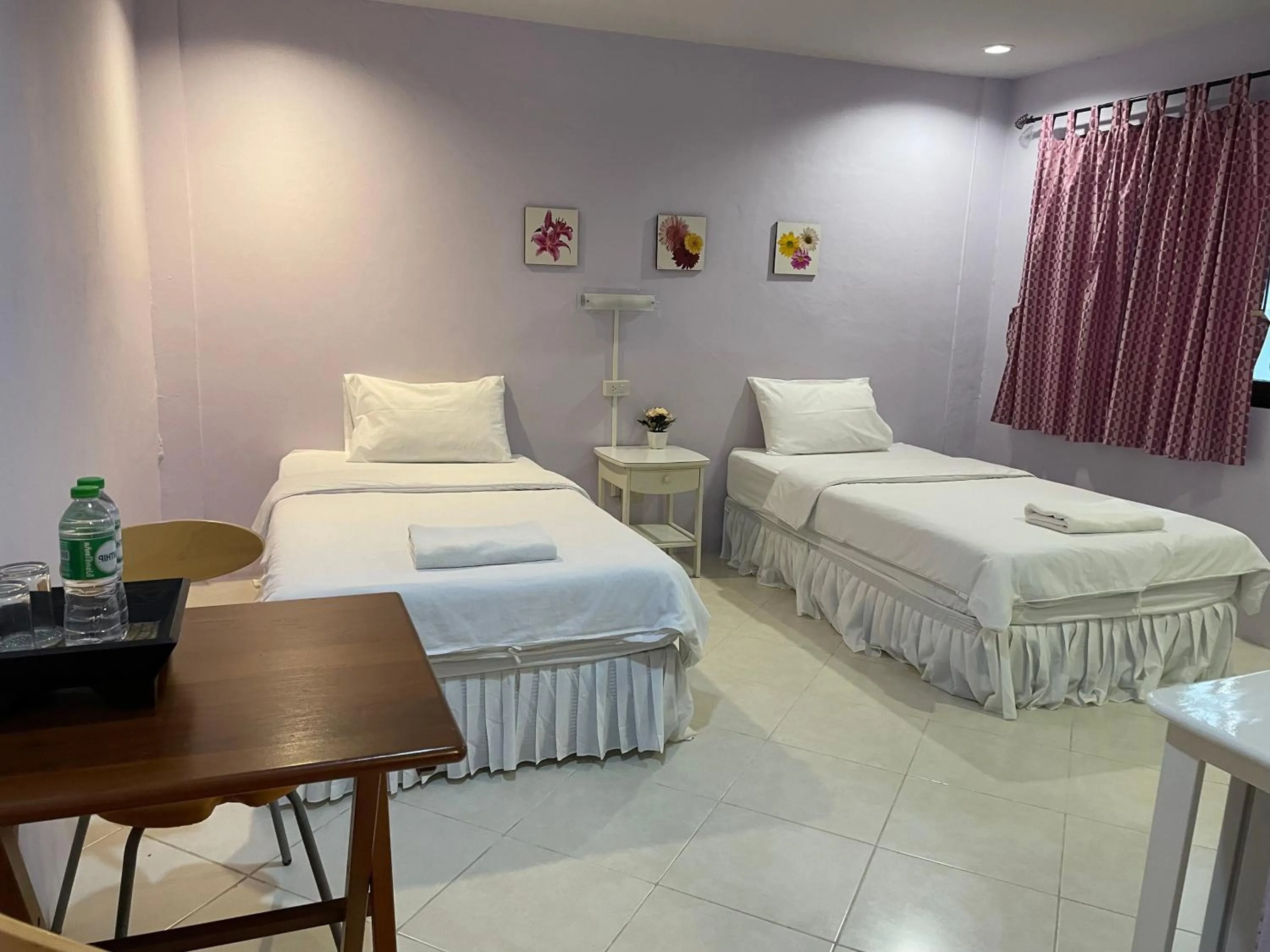 Bed in Nawaporn Place