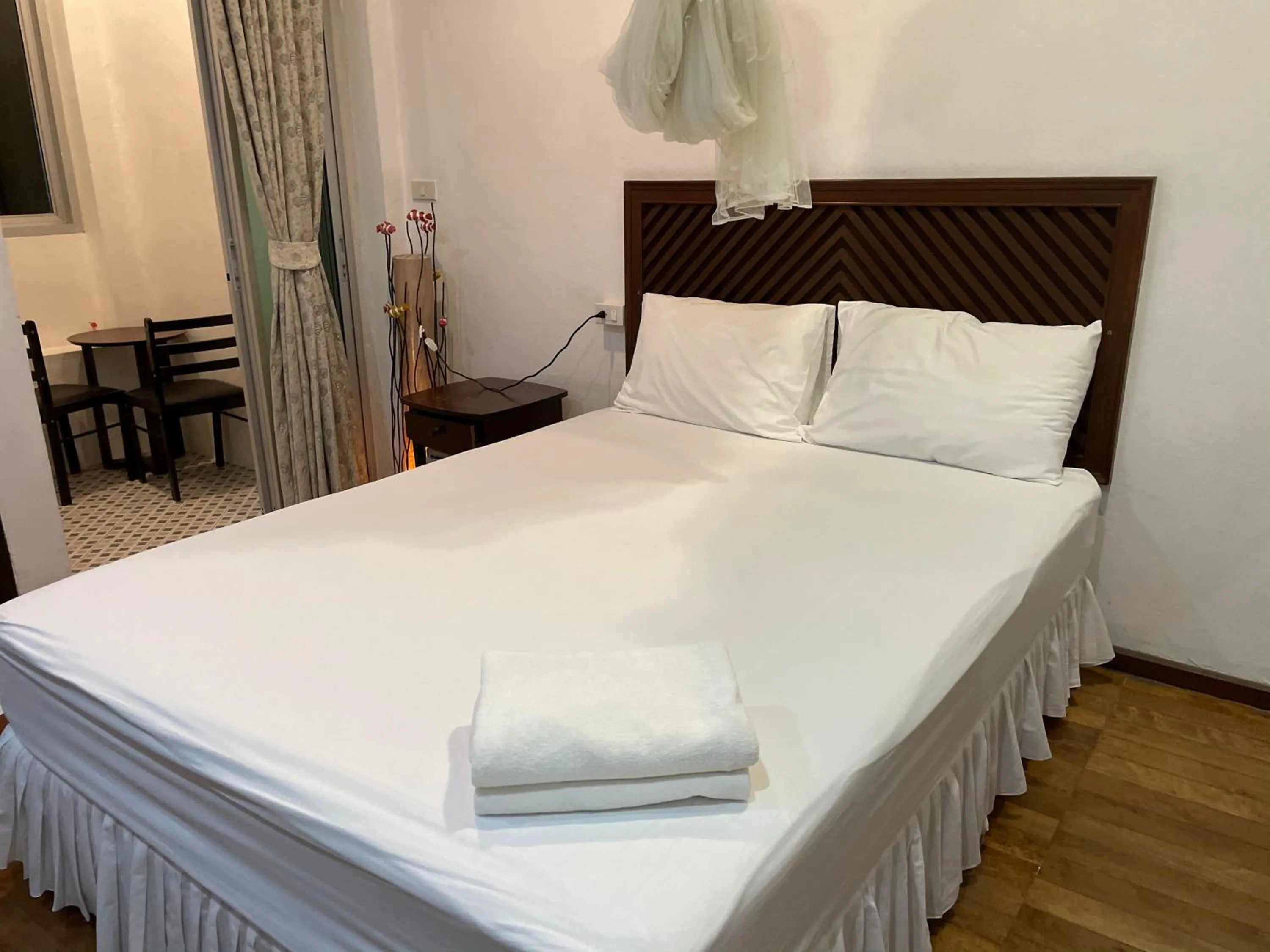 Bed in Nawaporn Place