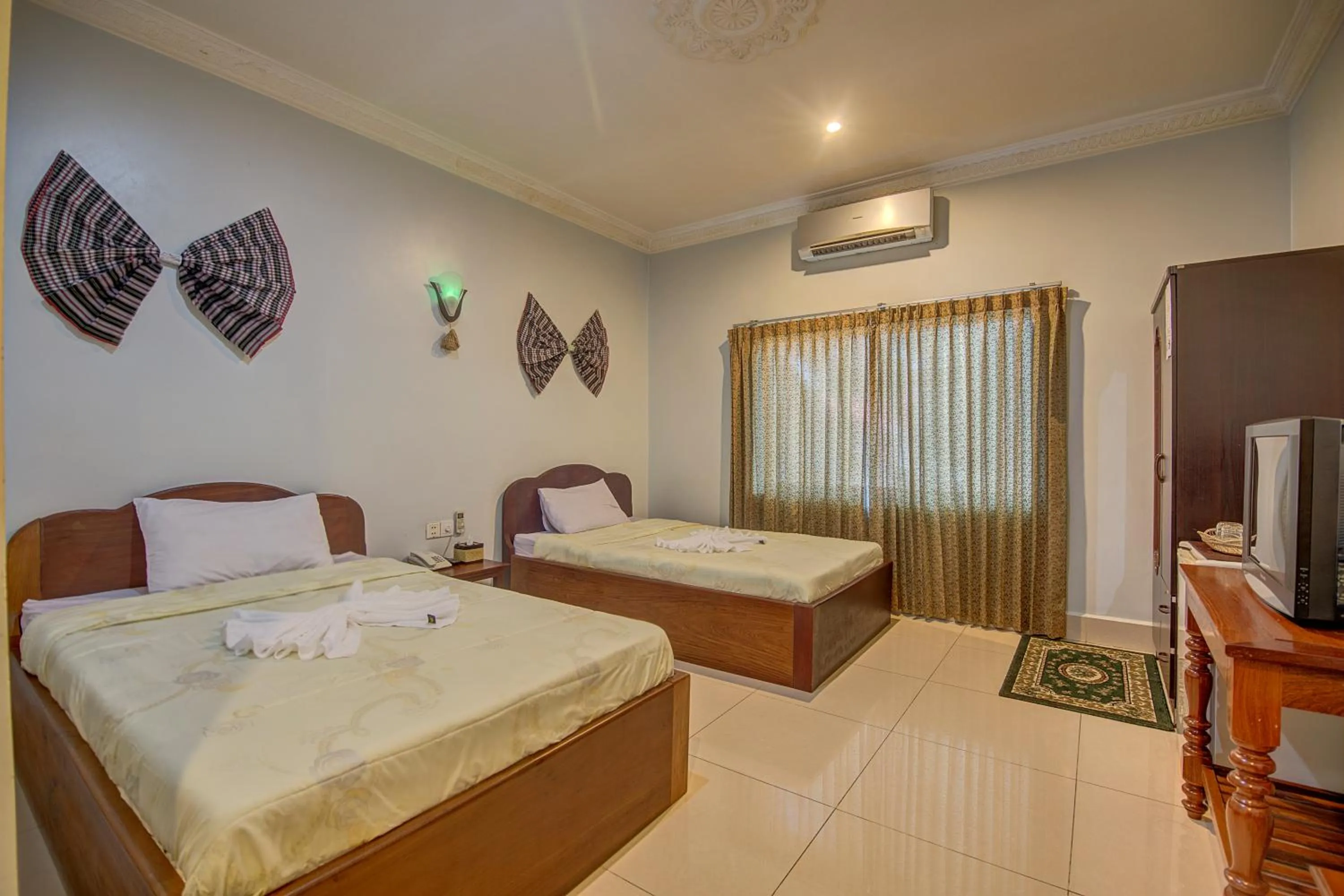 Photo of the whole room, Bed in DV Angkor Villa