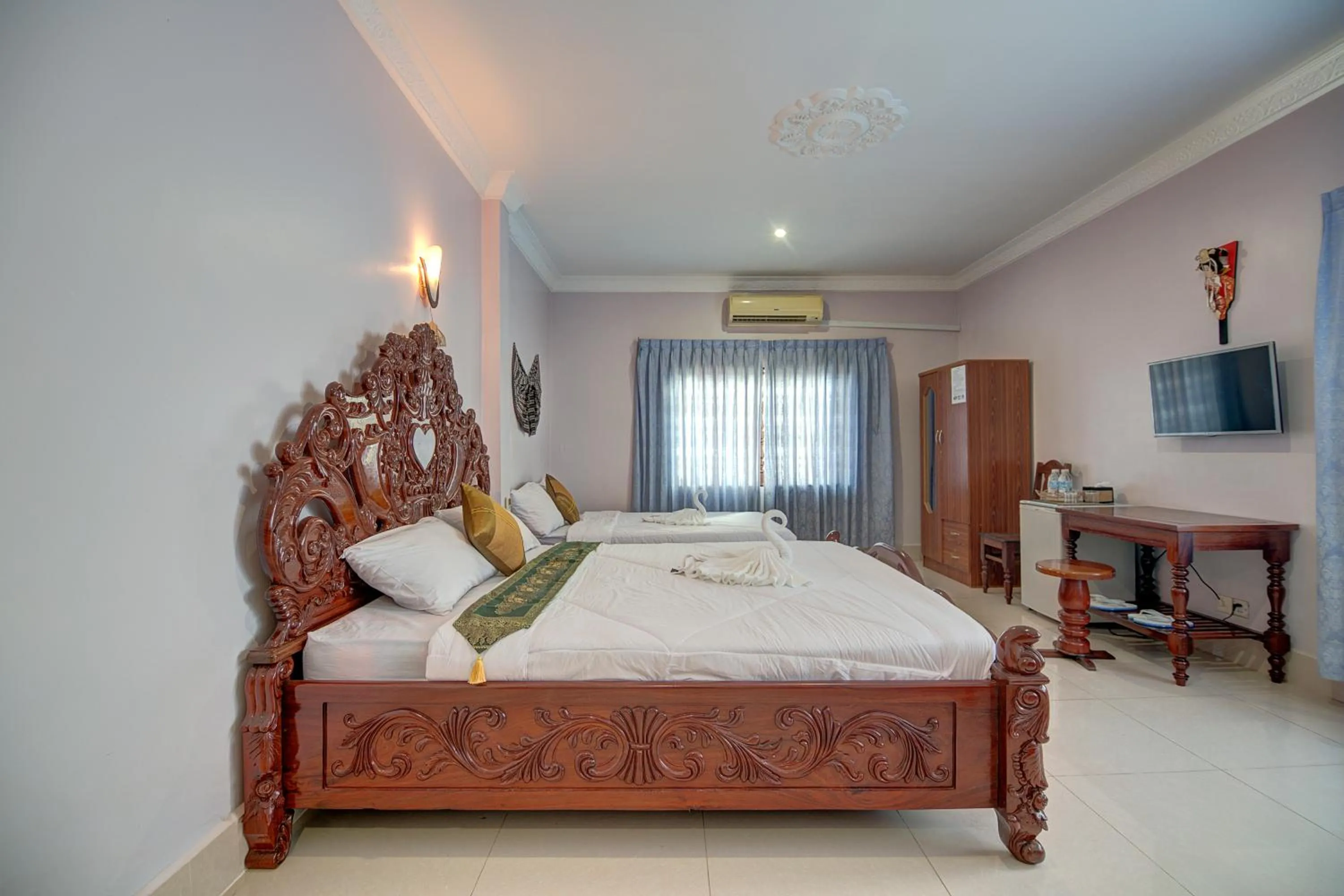 Photo of the whole room, Bed in DV Angkor Villa
