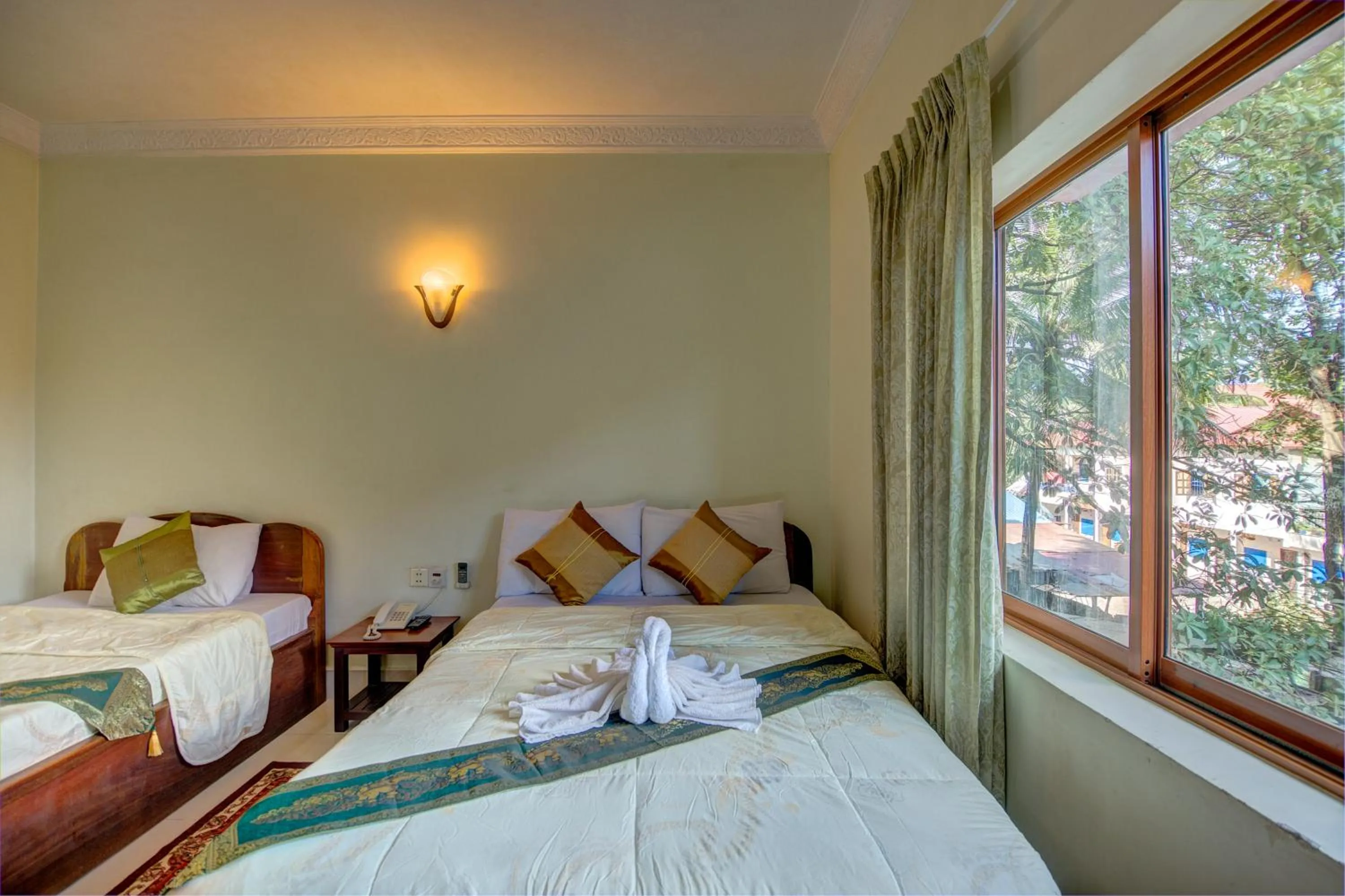 Photo of the whole room, Bed in DV Angkor Villa