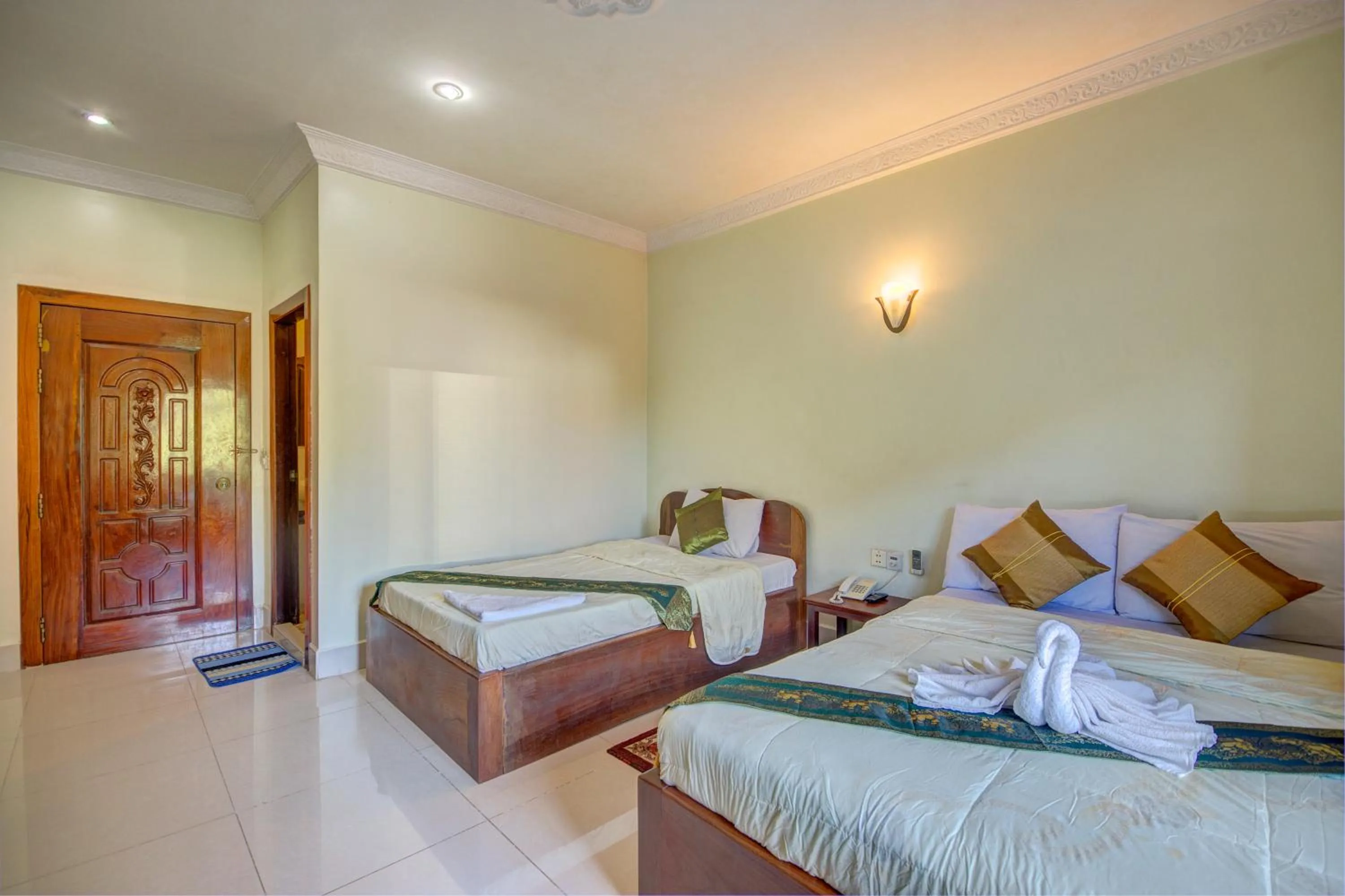 Photo of the whole room, Bed in DV Angkor Villa