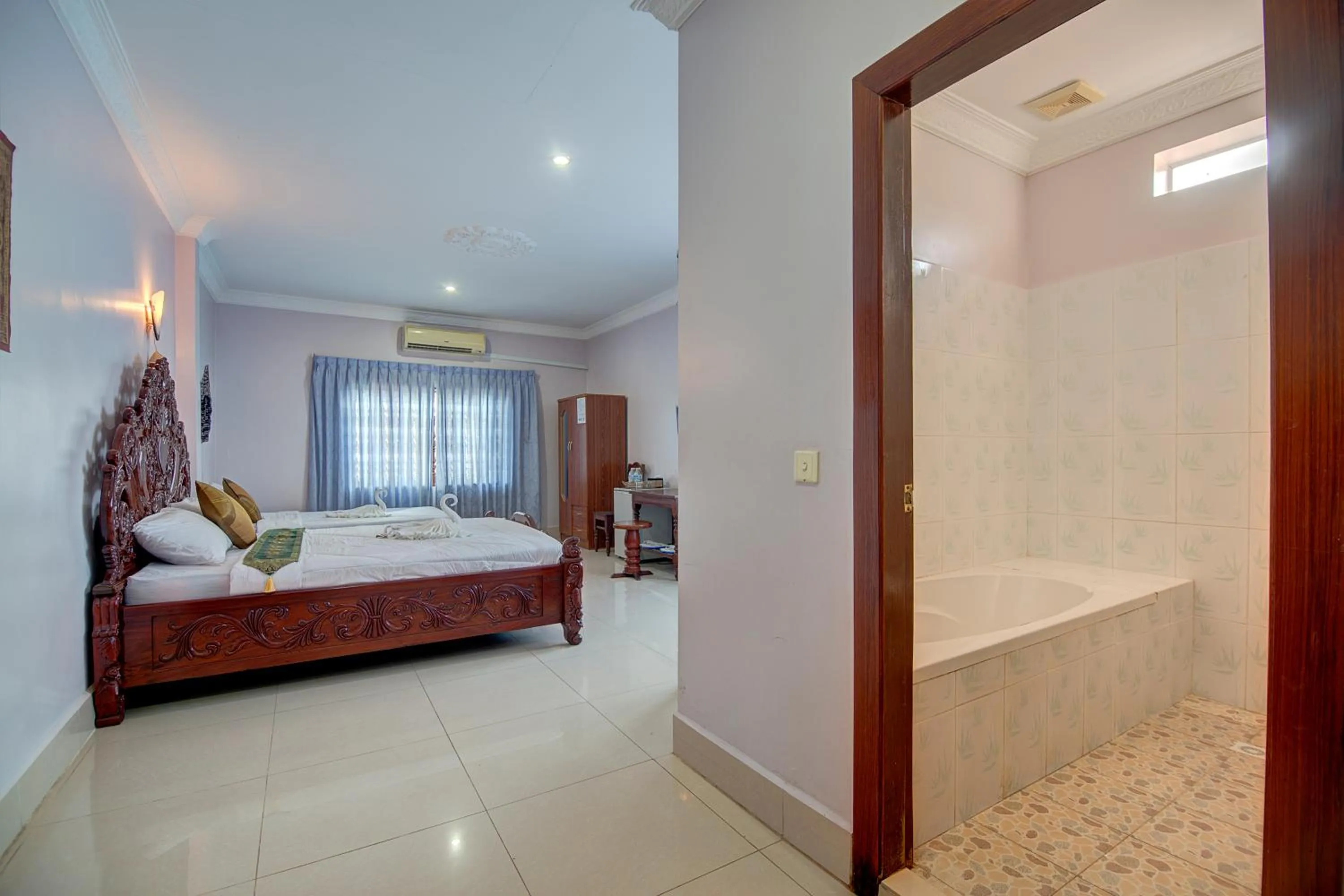 Photo of the whole room, Bed in DV Angkor Villa