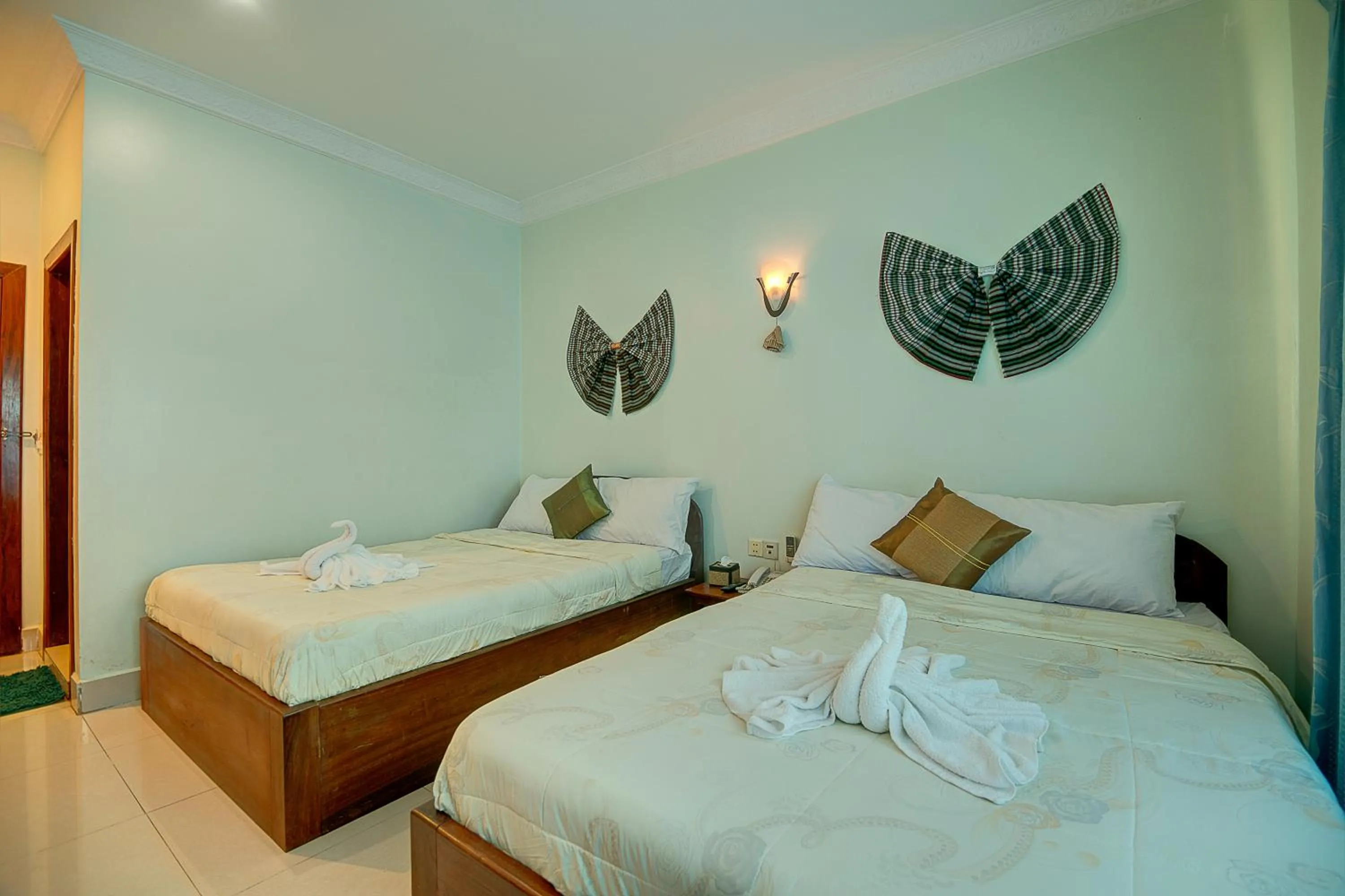 Photo of the whole room, Bed in DV Angkor Villa