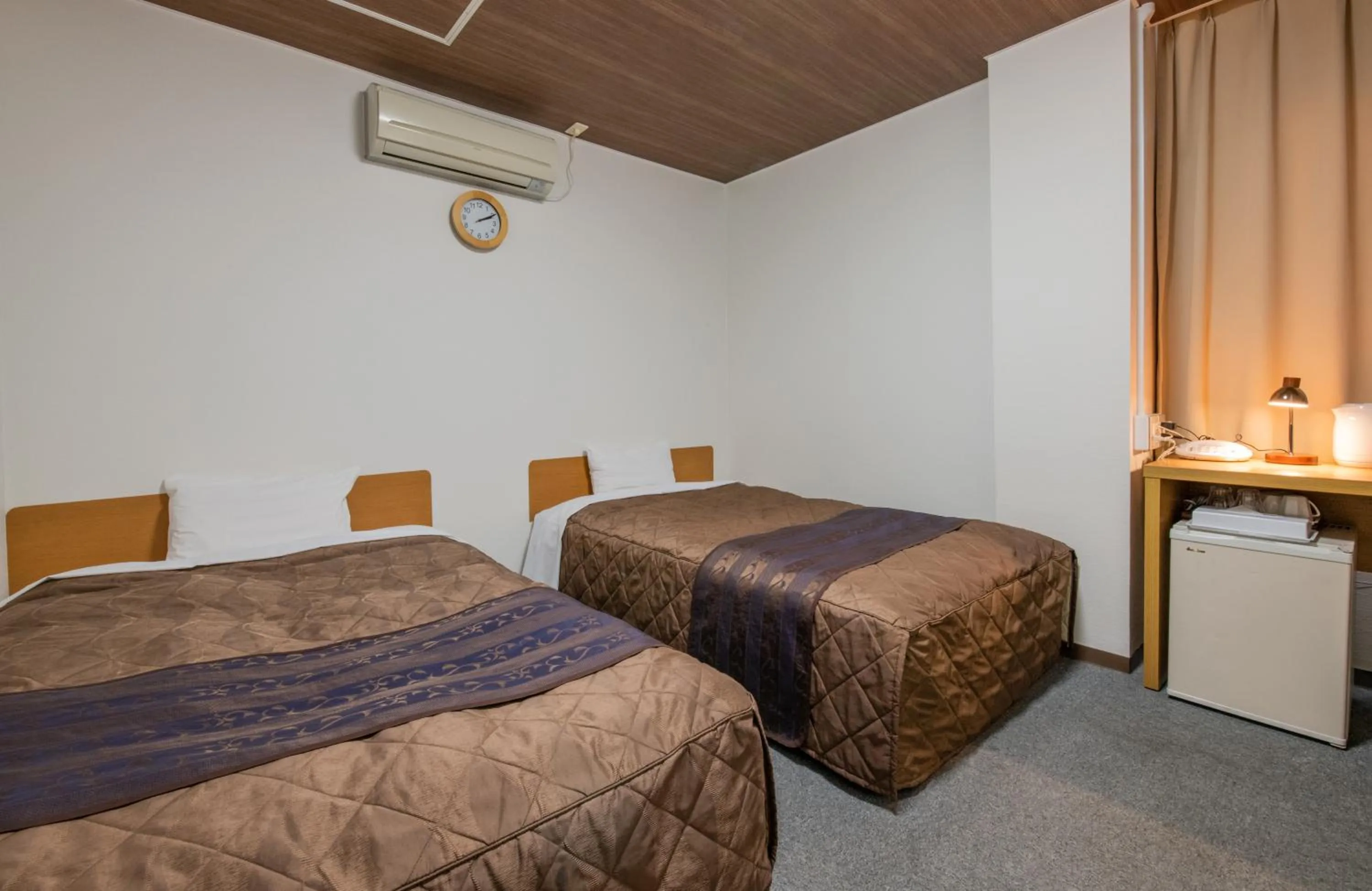 Bed in Hotel Wakamatsu Excel