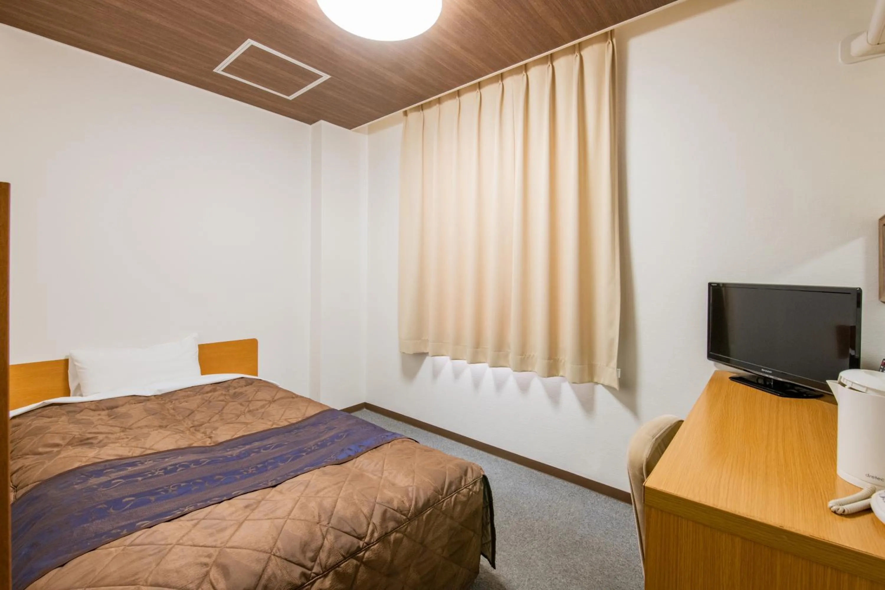 Bed in Hotel Wakamatsu Excel