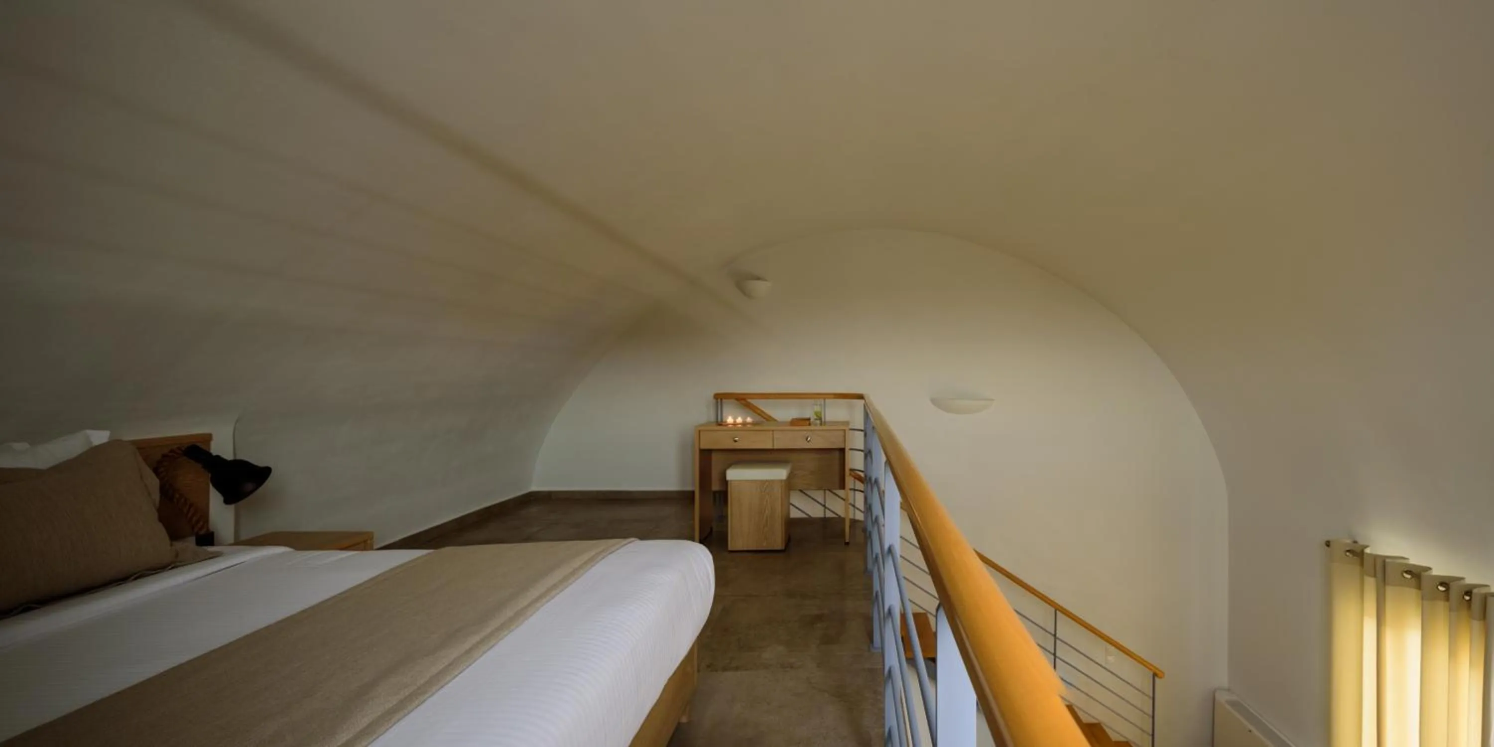 Bed in Aliter Suites