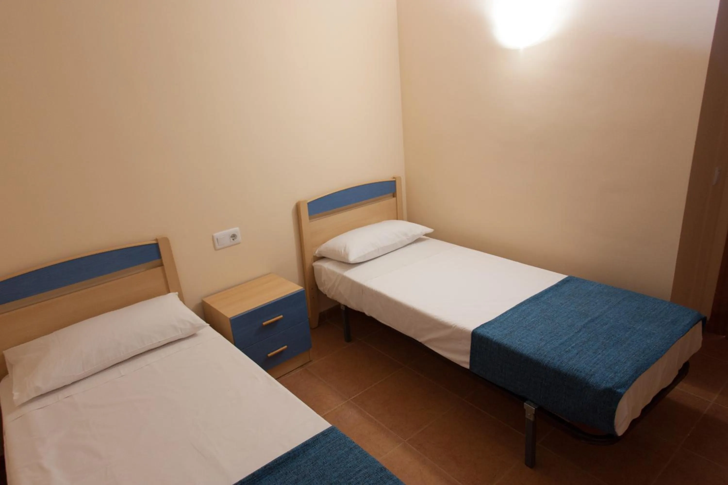Bedroom, Bed in Apartamentos Río Guadalaviar