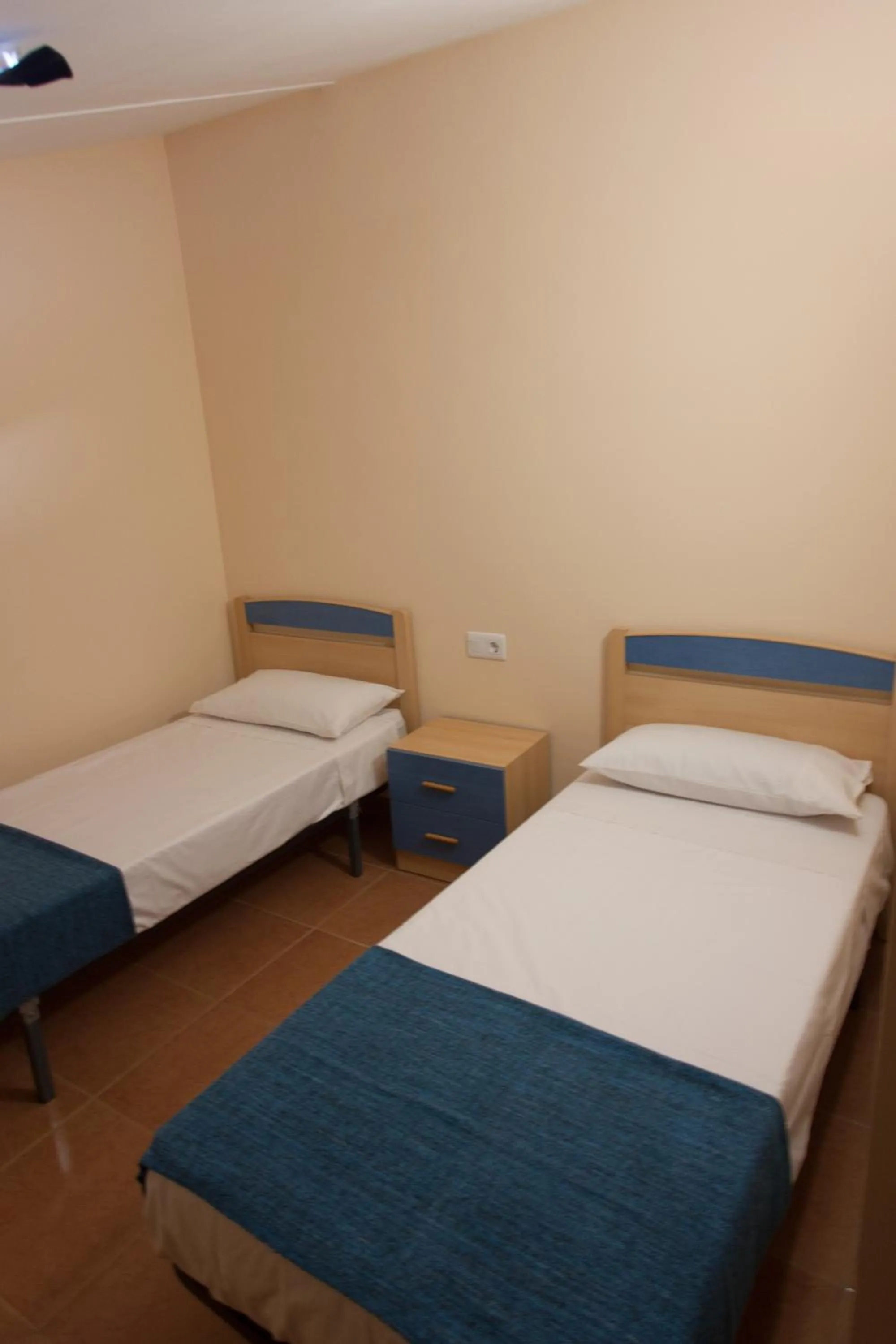 Bedroom, Bed in Apartamentos Río Guadalaviar