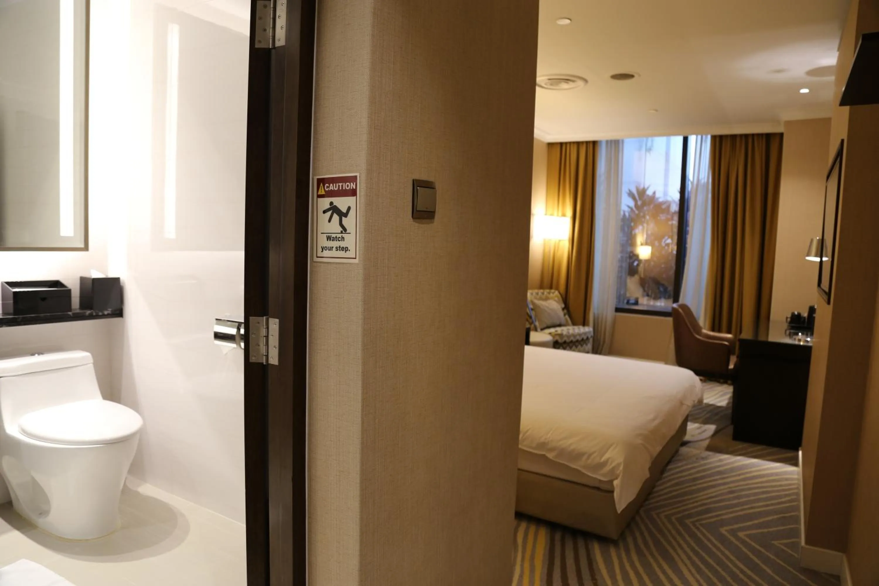 Toilet, Bed in Ambassador Transit Hotel - Terminal 2