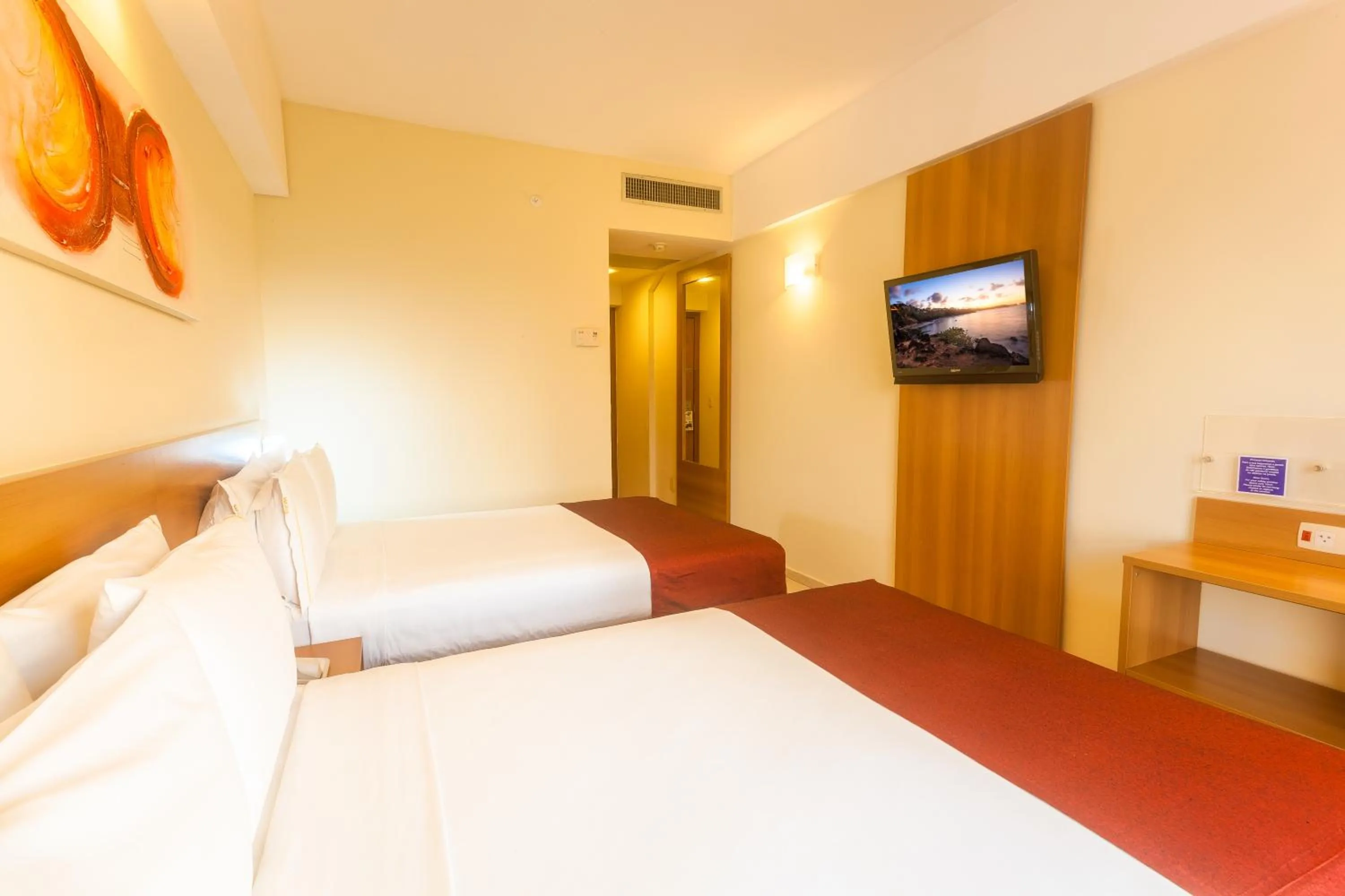 Bed in Praiamar Express Hotel