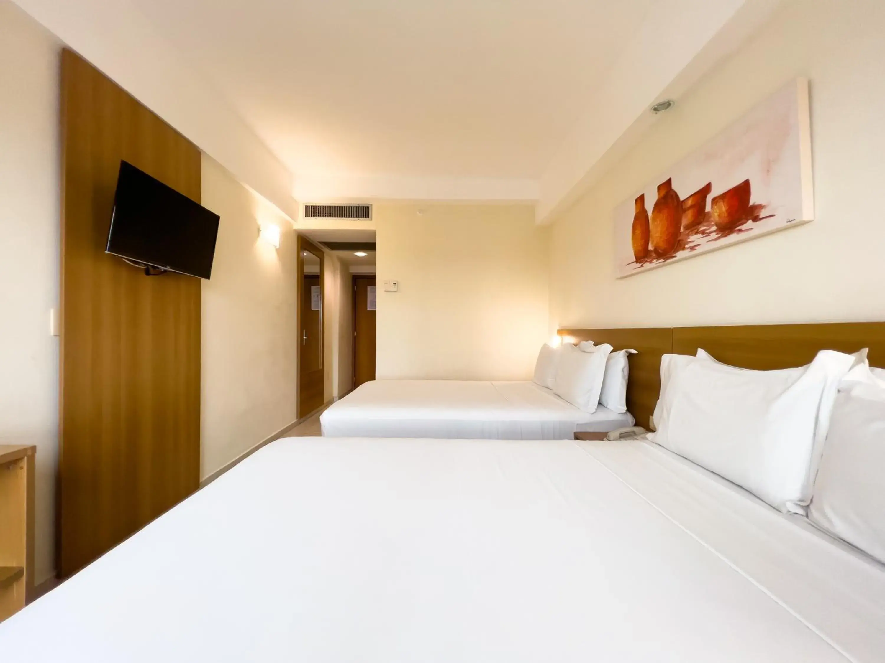 Standard Room with Two Double Beds in Praiamar Express Hotel Standard Room with Two Double Beds in Praiamar Express Hotel