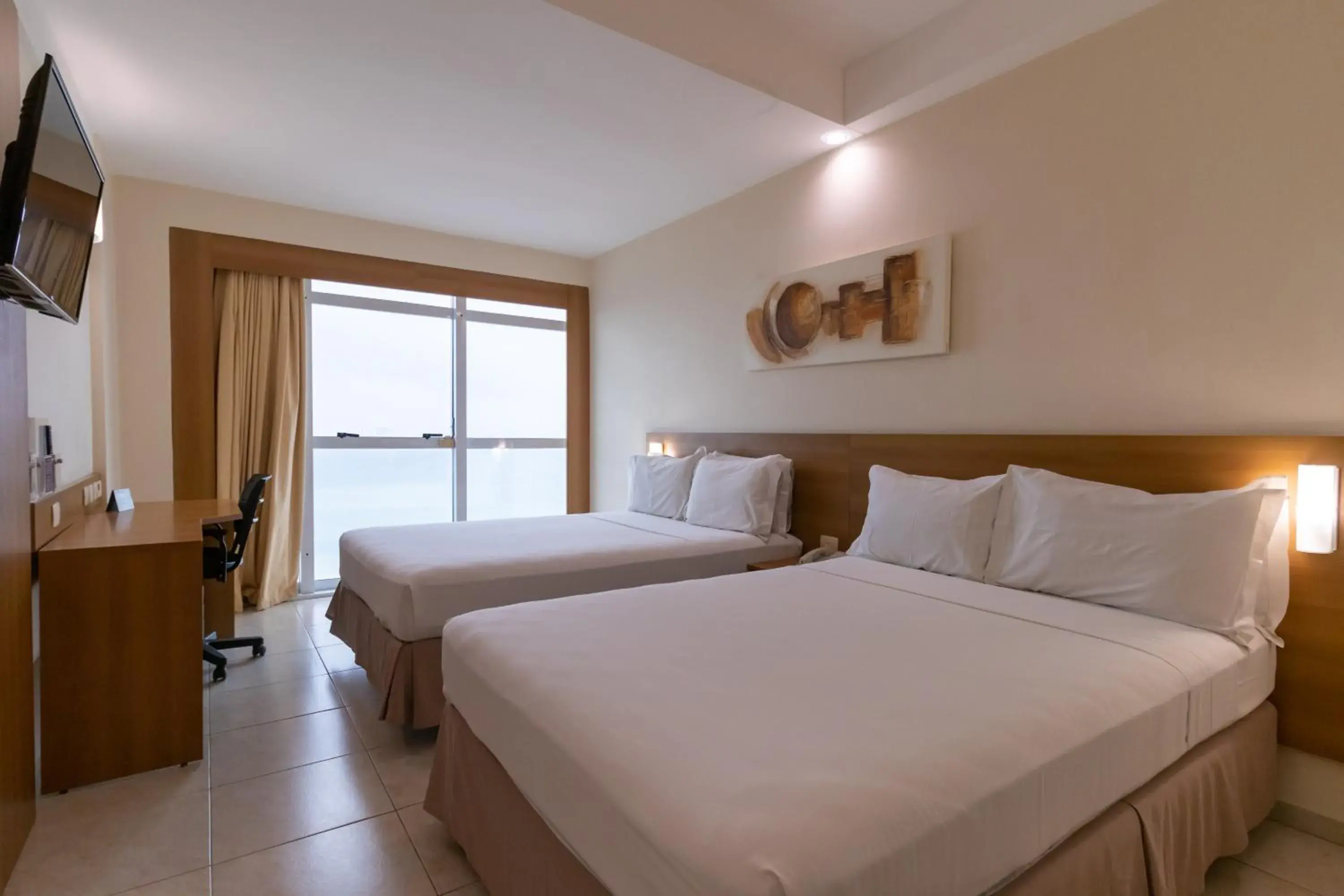 Superior Room with Two Double Beds and Sea View in Praiamar Express Hotel Superior Room with Two Double Beds and Sea View in Praiamar Express Hotel