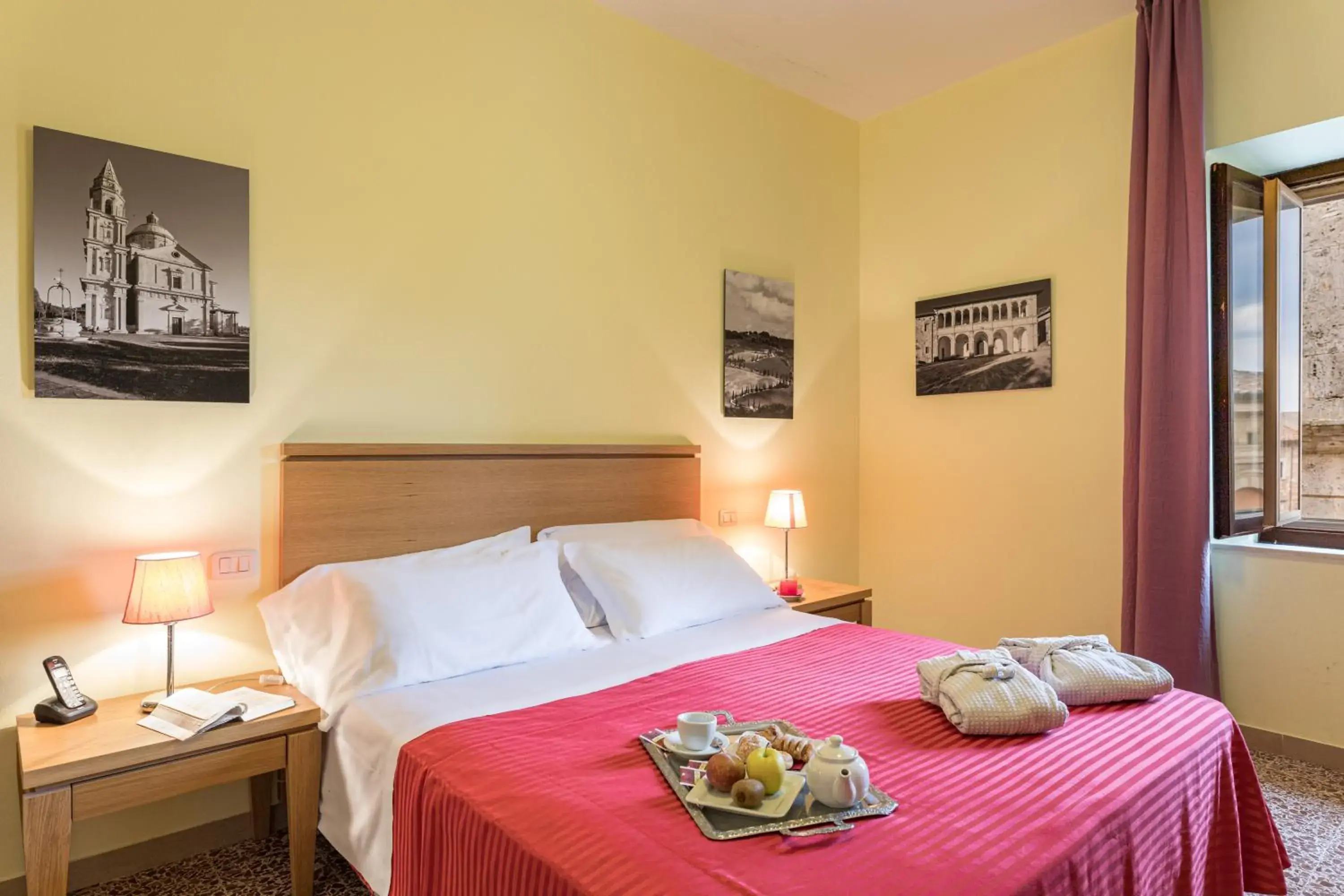 Photo of the whole room, Bed in Bellarmino Boutique Apartments, Montepulciano Photo of the whole room, Bed in Bellarmino Boutique Apartments, Montepulciano