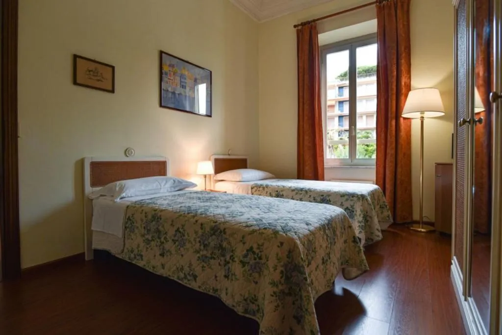 Bed in Grand Hotel De Londres