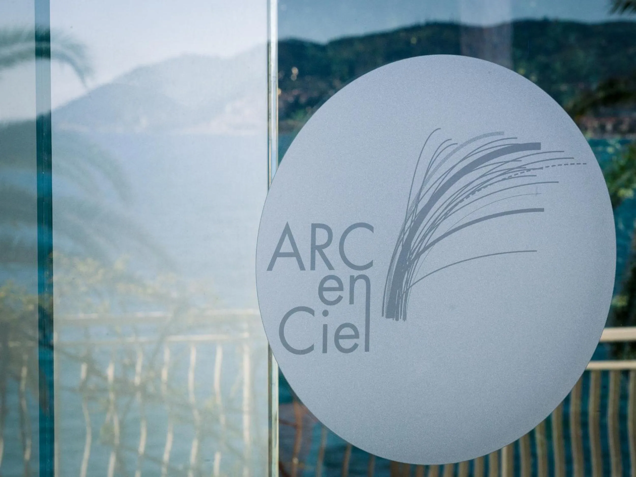 Property logo or sign in Hotel Arc En Ciel