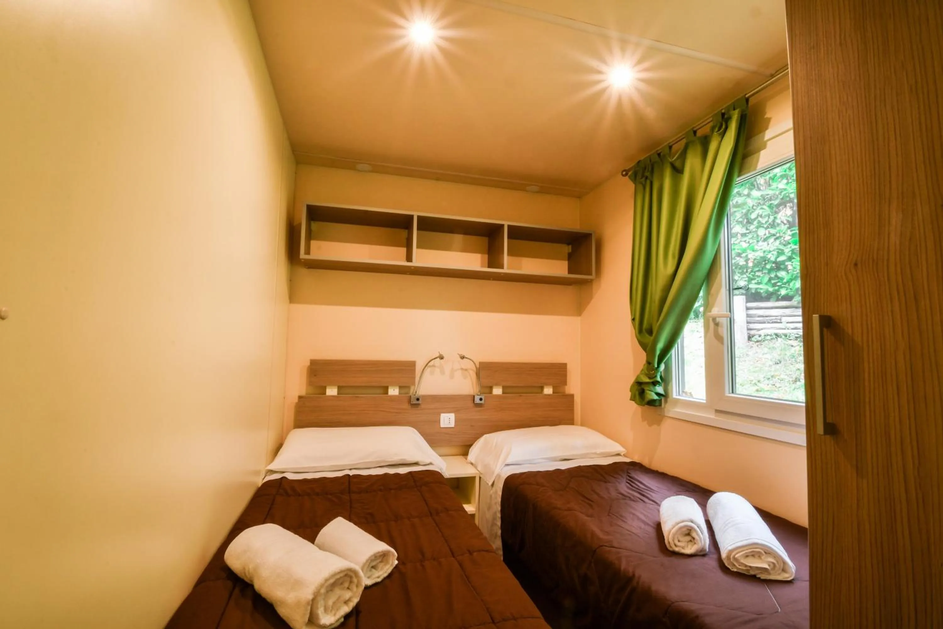 Bedroom, Bed in hu Norcenni Girasole village