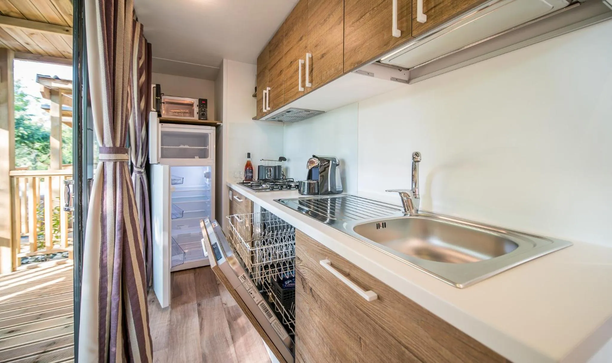 Kitchen or kitchenette in hu Norcenni Girasole village