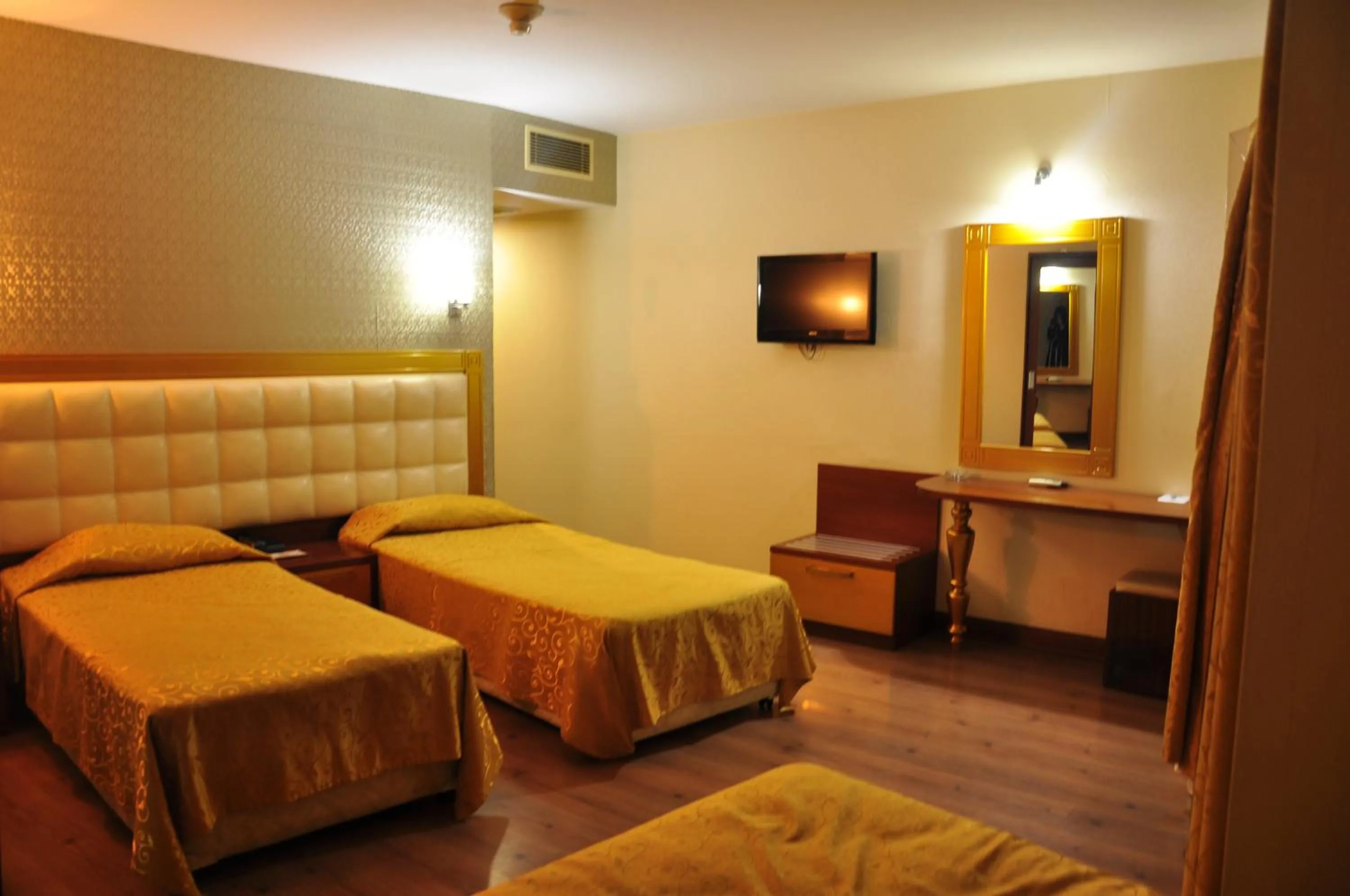 Communal lounge/ TV room, Bed in Kayalar Hotel