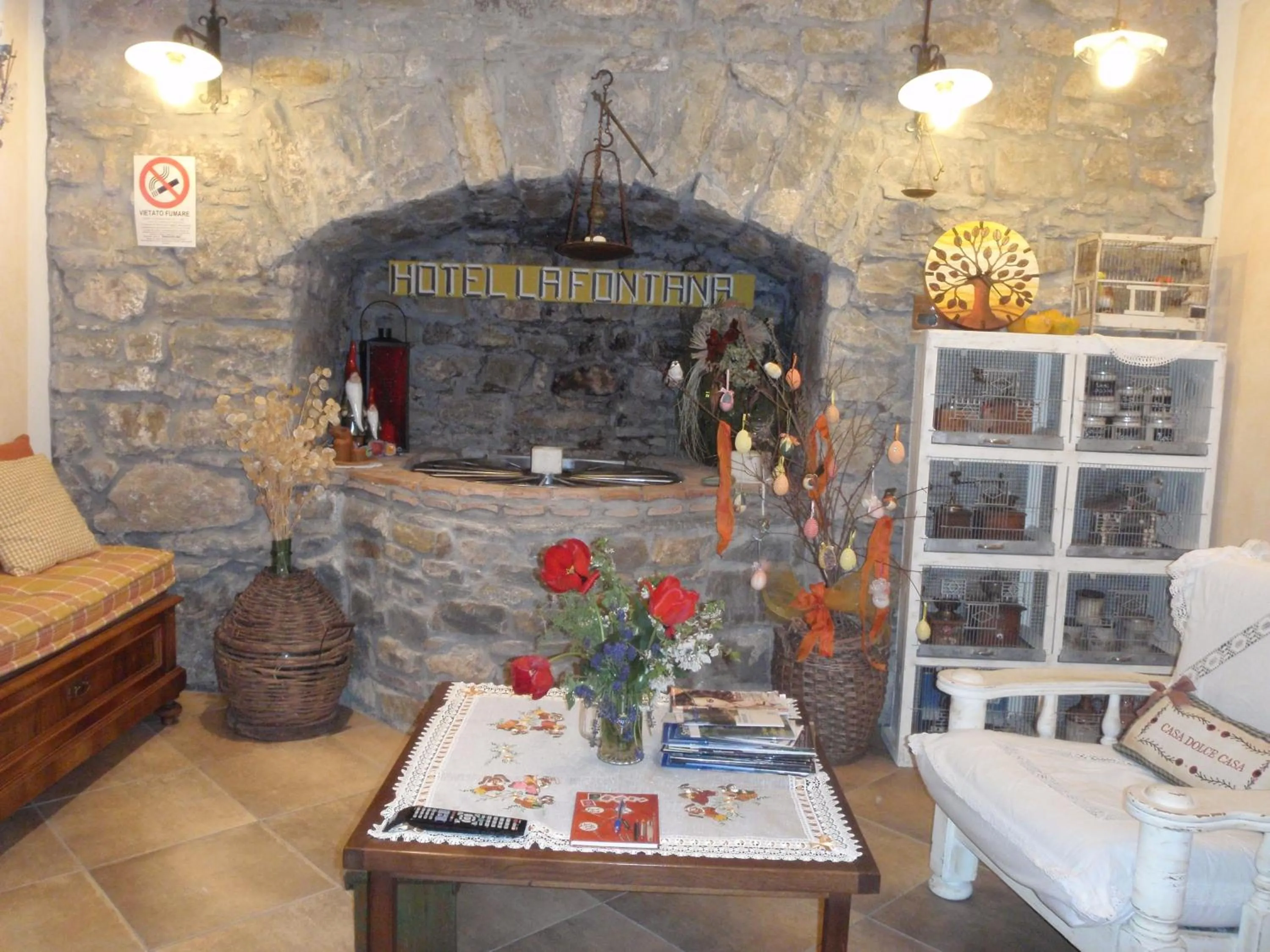 Communal lounge/ TV room in Hotel La Fontana