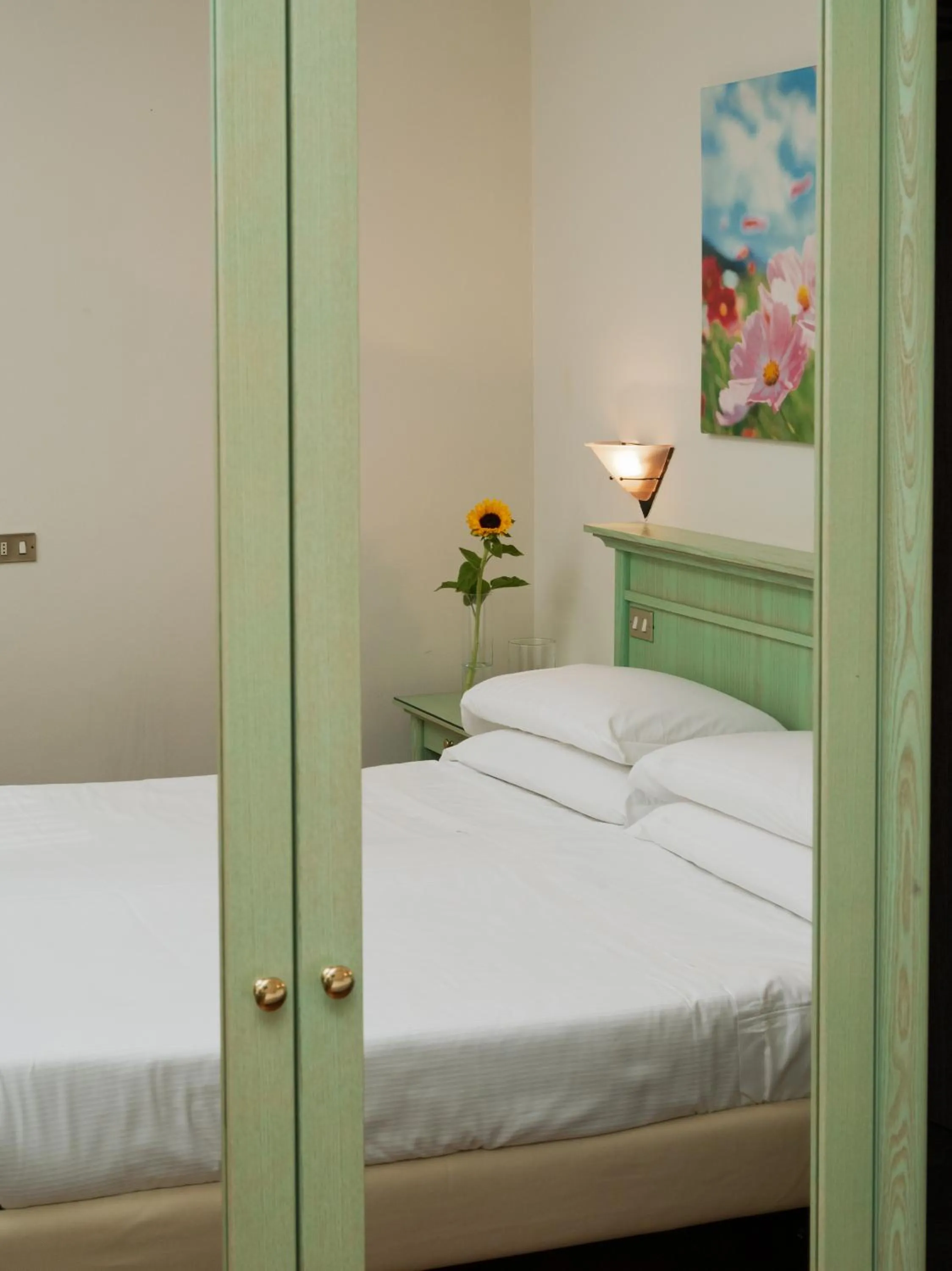 Bed in Hotel Donatello