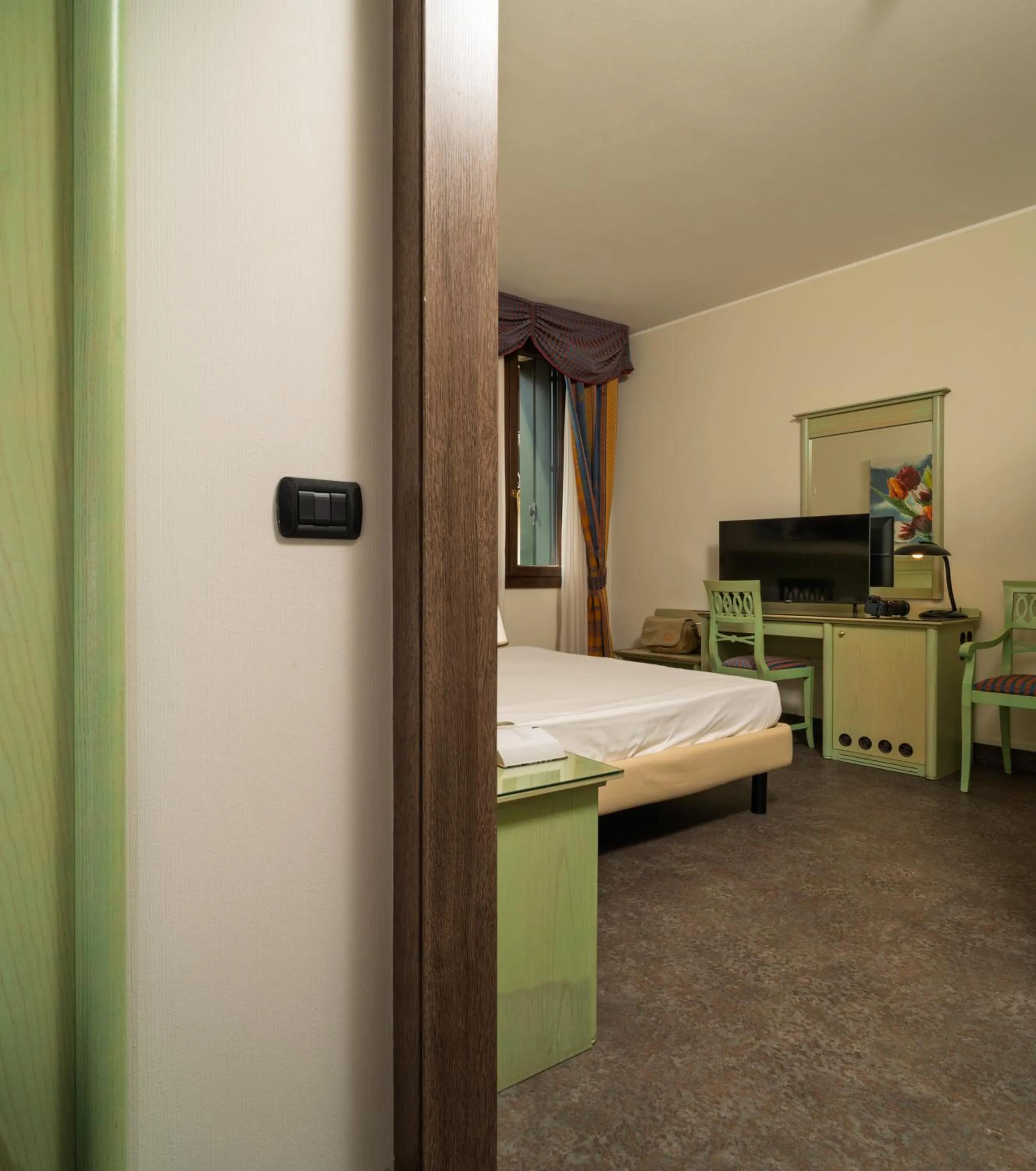 Bed in Hotel Donatello