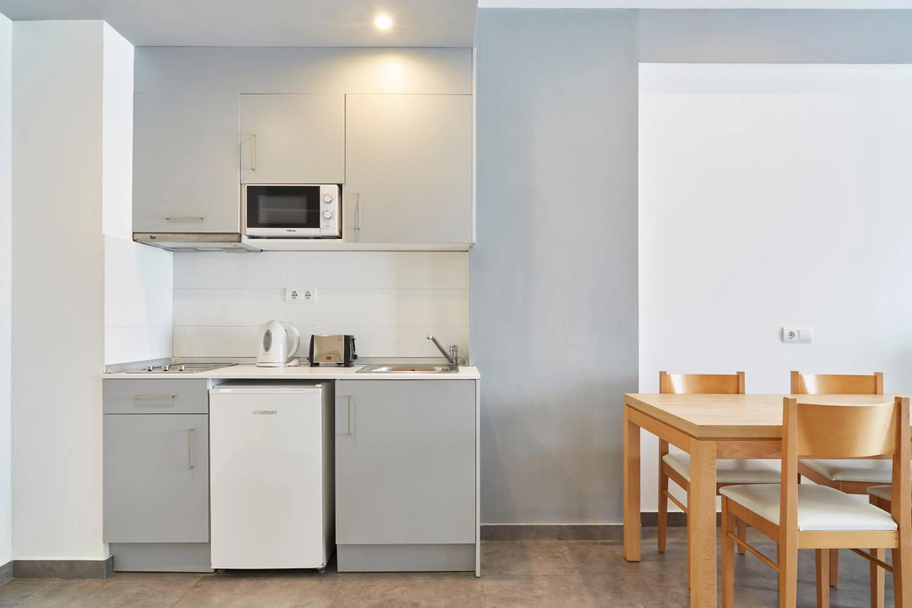 Kitchen or kitchenette in Invisa Hotel Casa Luis