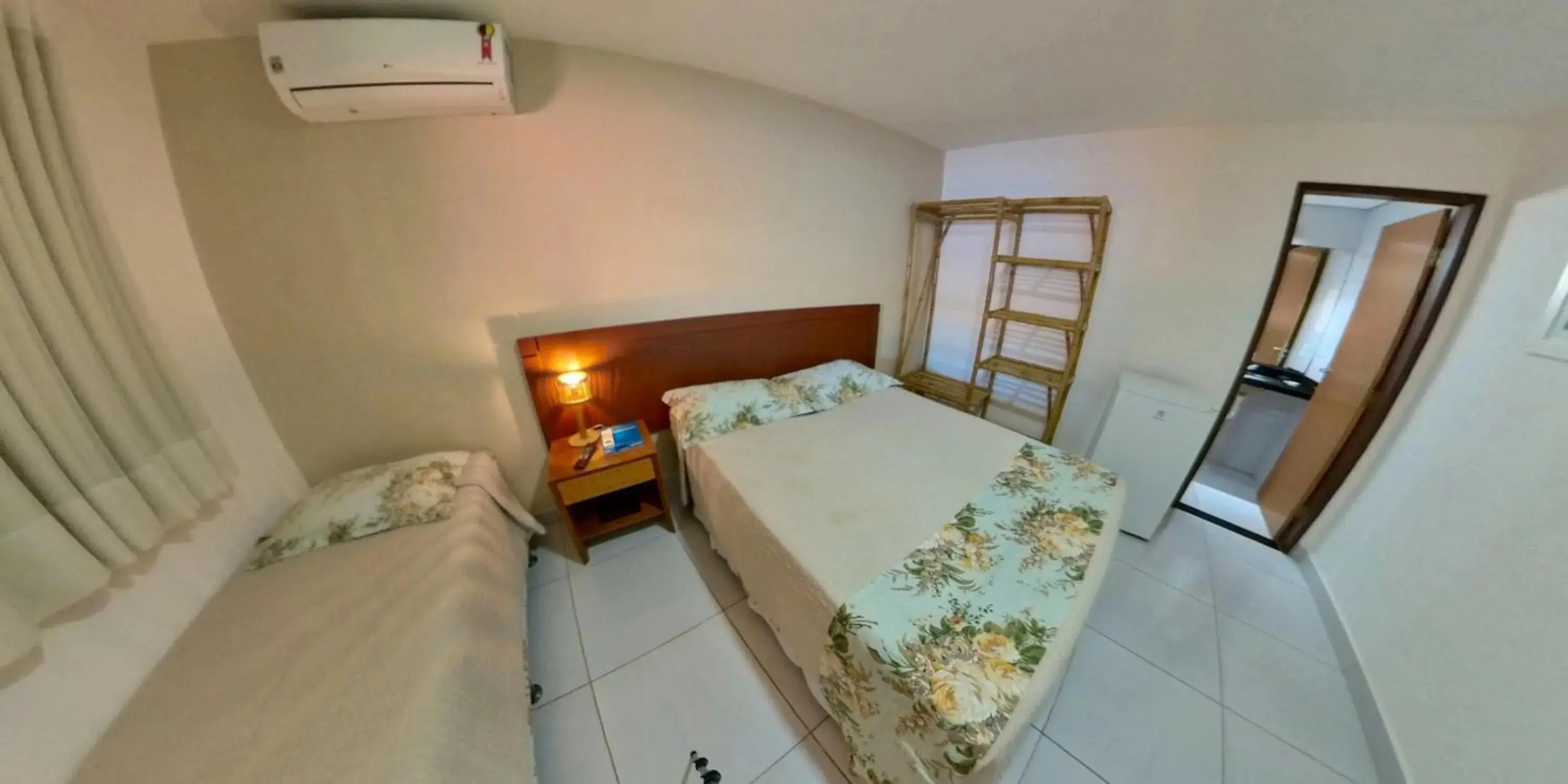 Budget Triple Room - single occupancy in Pousada Mar e Brisa Budget Triple Room - single occupancy in Pousada Mar e Brisa