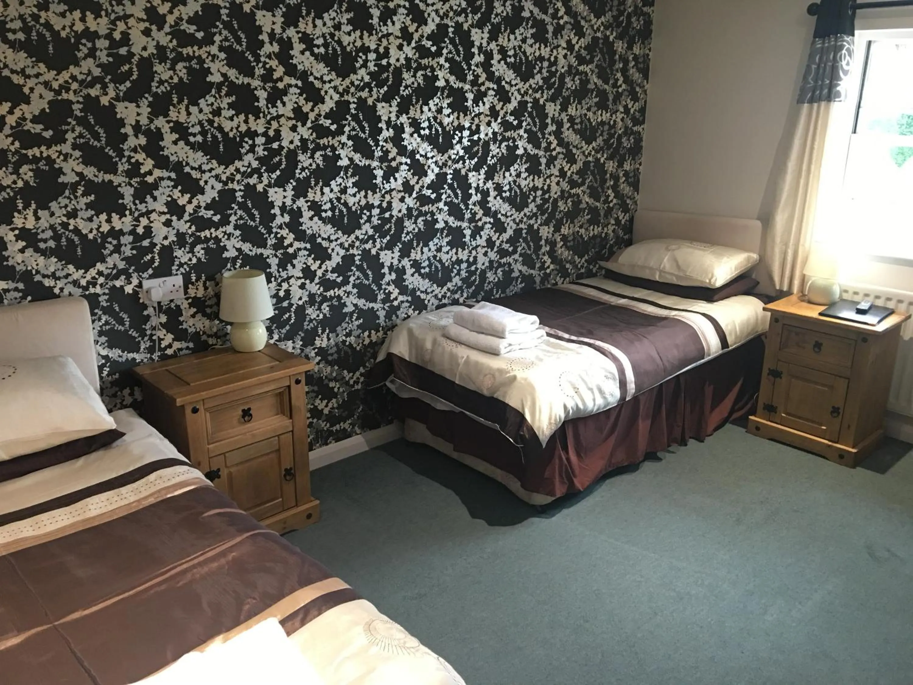 Photo of the whole room, Bed in The Half Moon