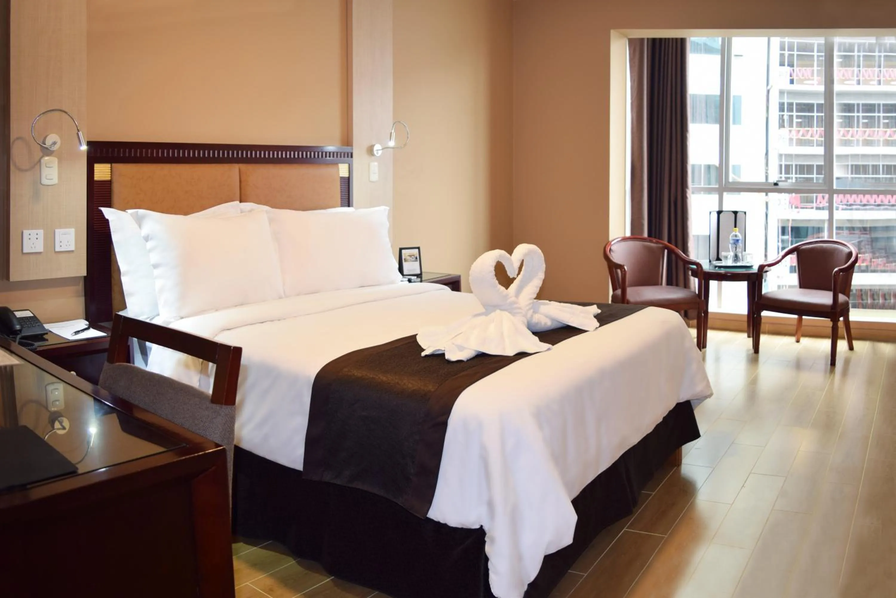 Photo of the whole room, Bed in Gran Mundo Hotel & Suites