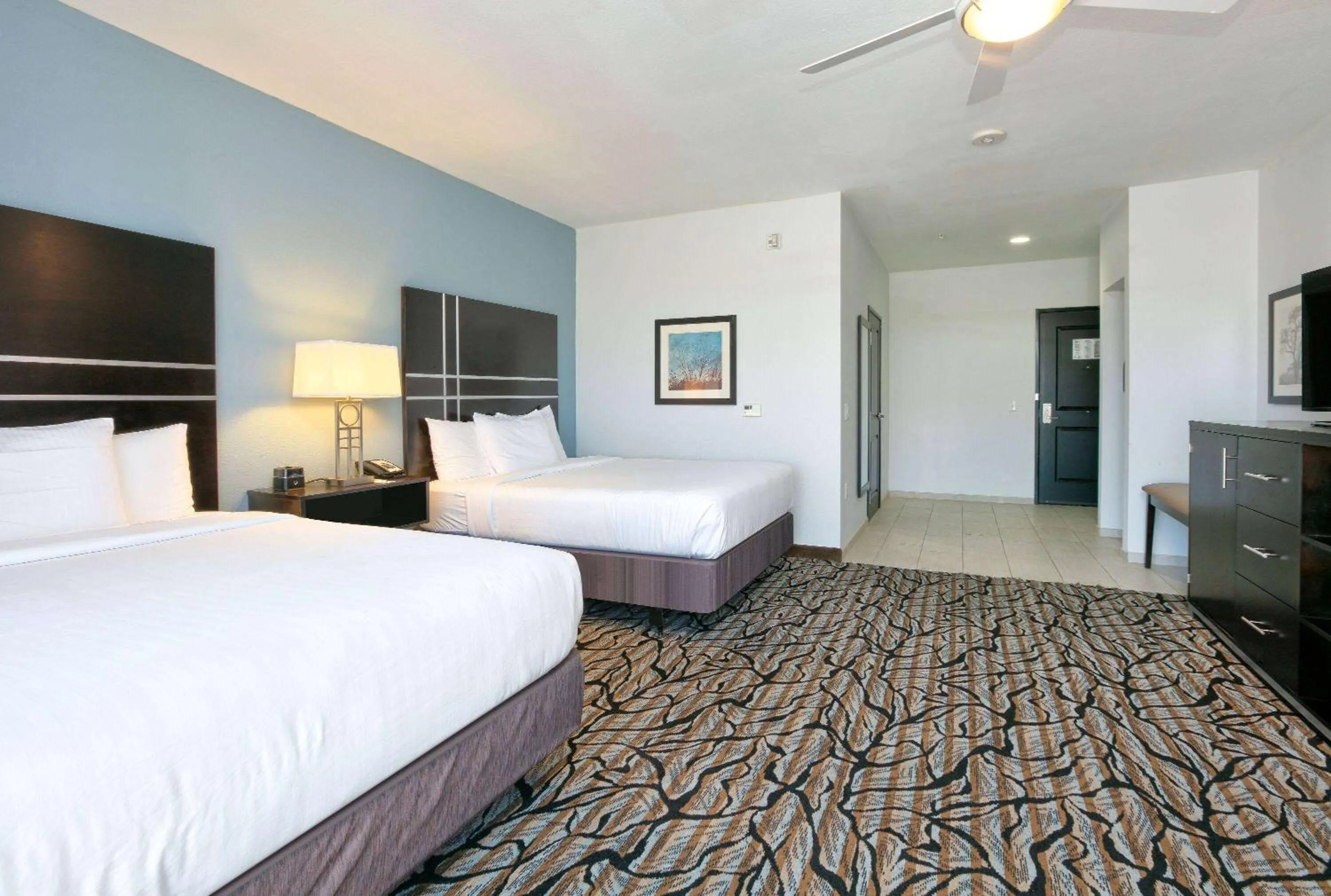 Photo of the whole room, Bed in La Quinta Inn & Suites by Wyndham Lubbock Southwest