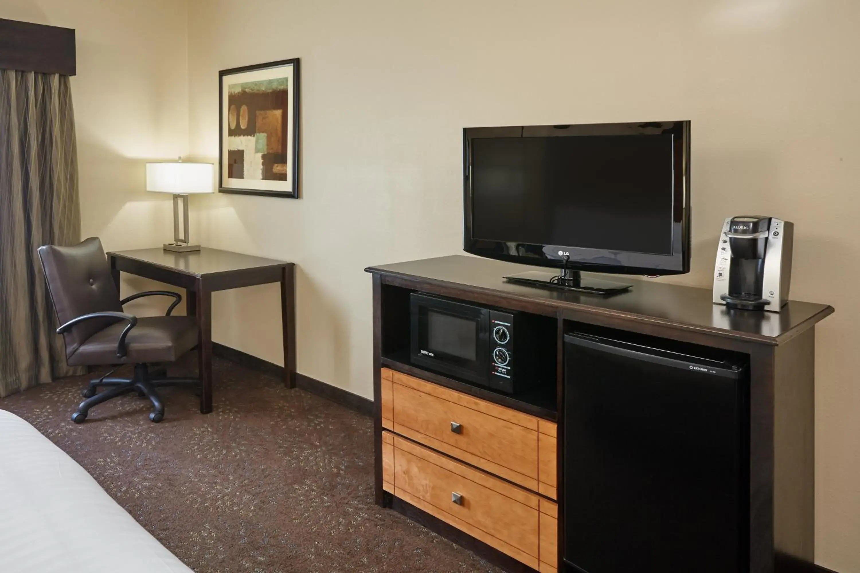 Photo of the whole room, TV/Entertainment Center in Holiday Inn Express Hotel & Suites Buford-Mall Of Georgia