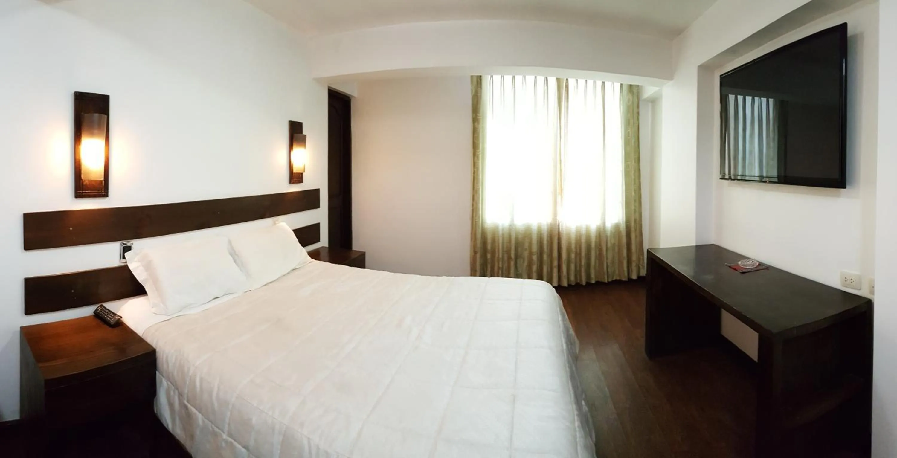 Bed in La Cabaña Hotel