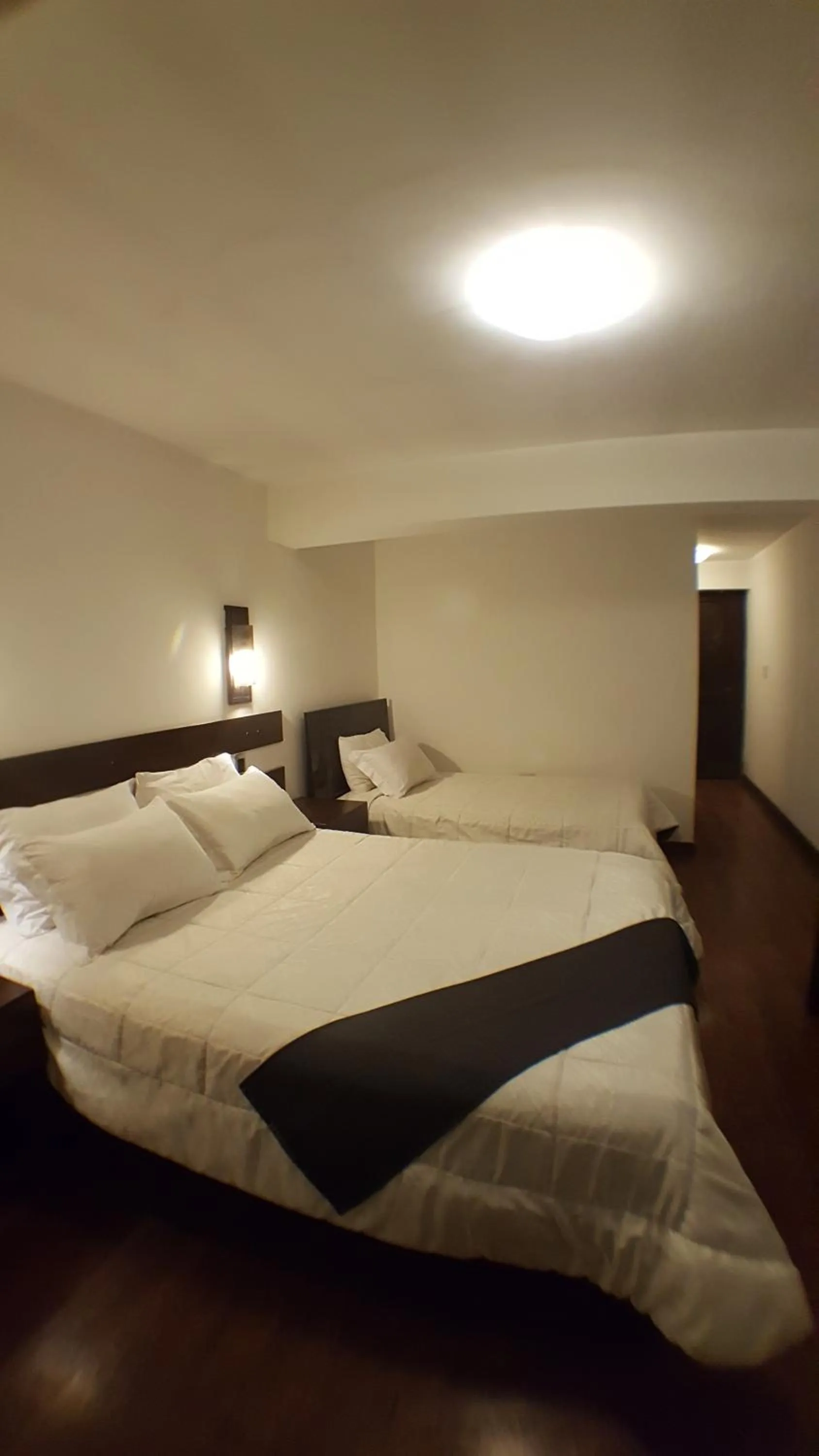 Bed in La Cabaña Hotel