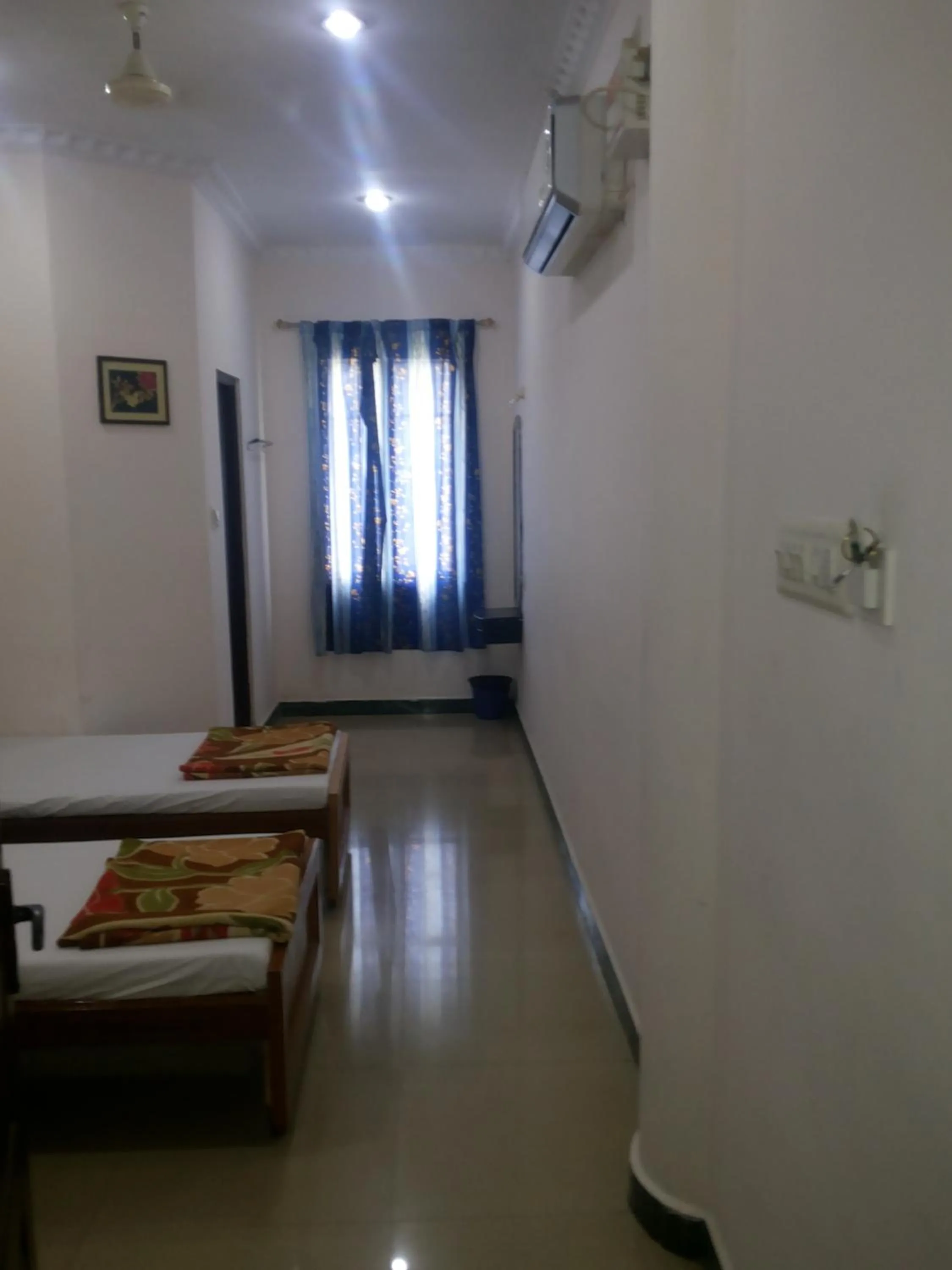 Bed in Hotel Nachiappa Palace