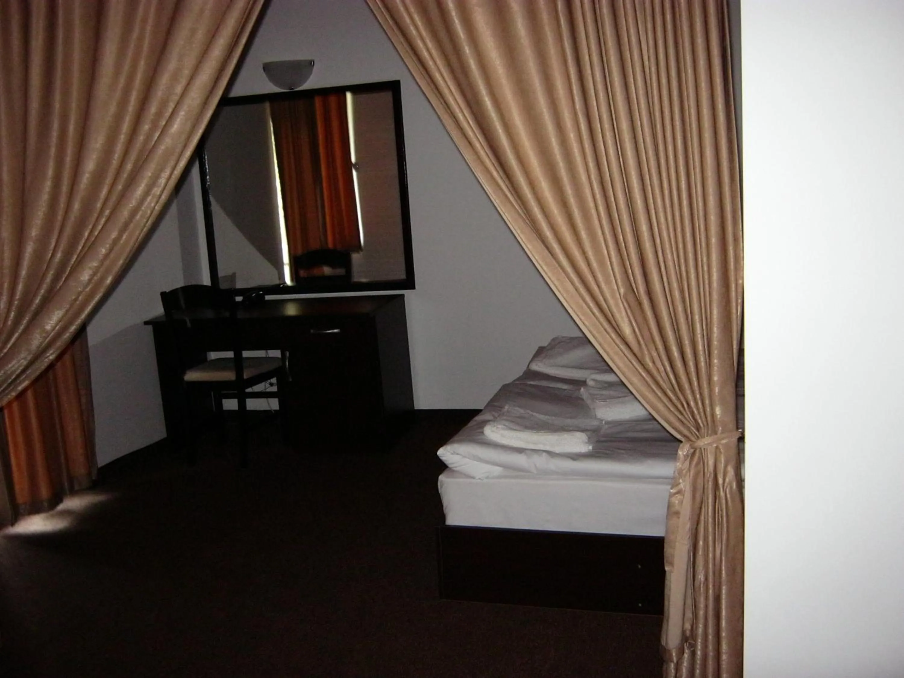 Bed in Motel Koziyat Rog