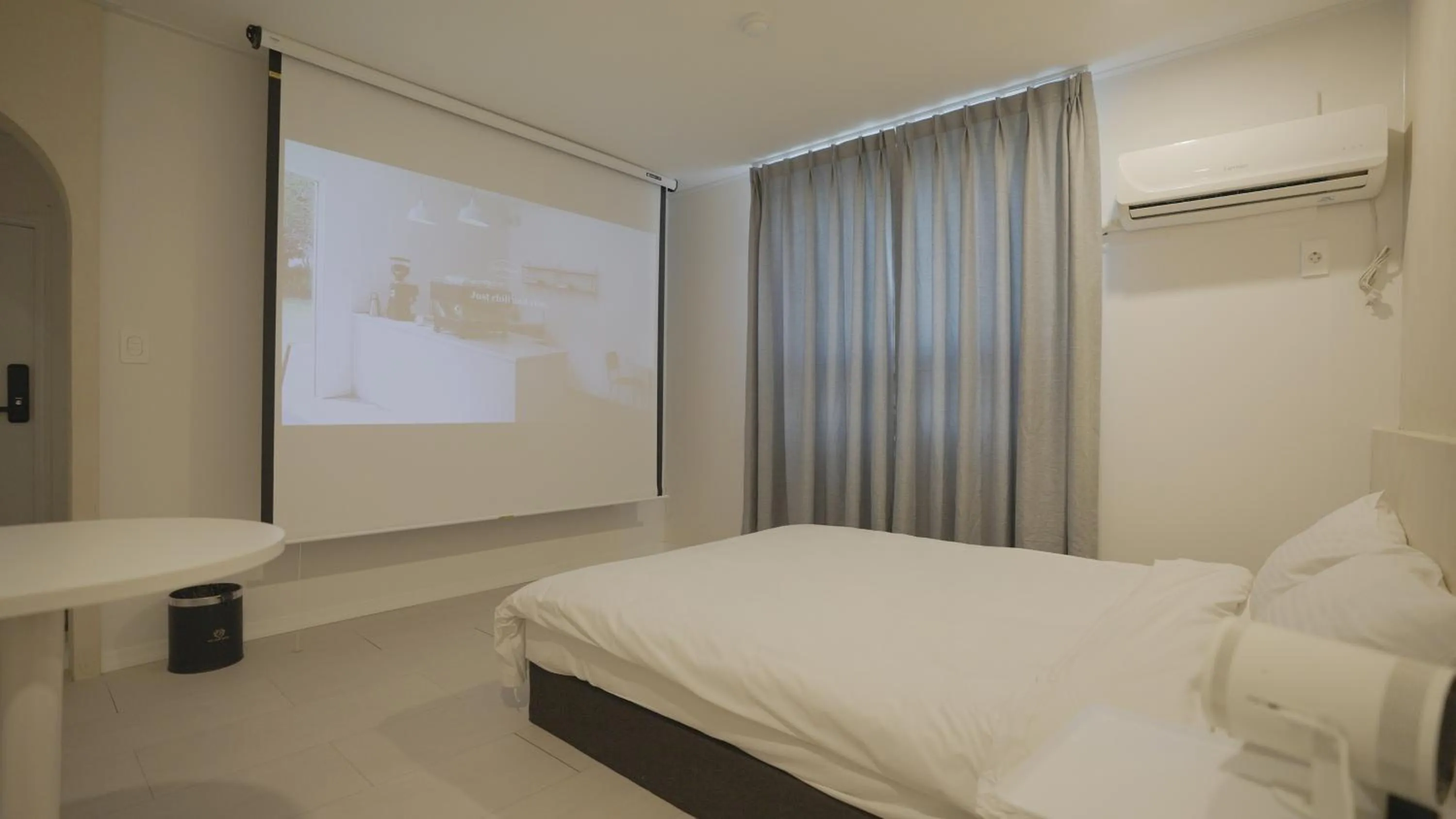 Bed in Jeju Stay Hotel