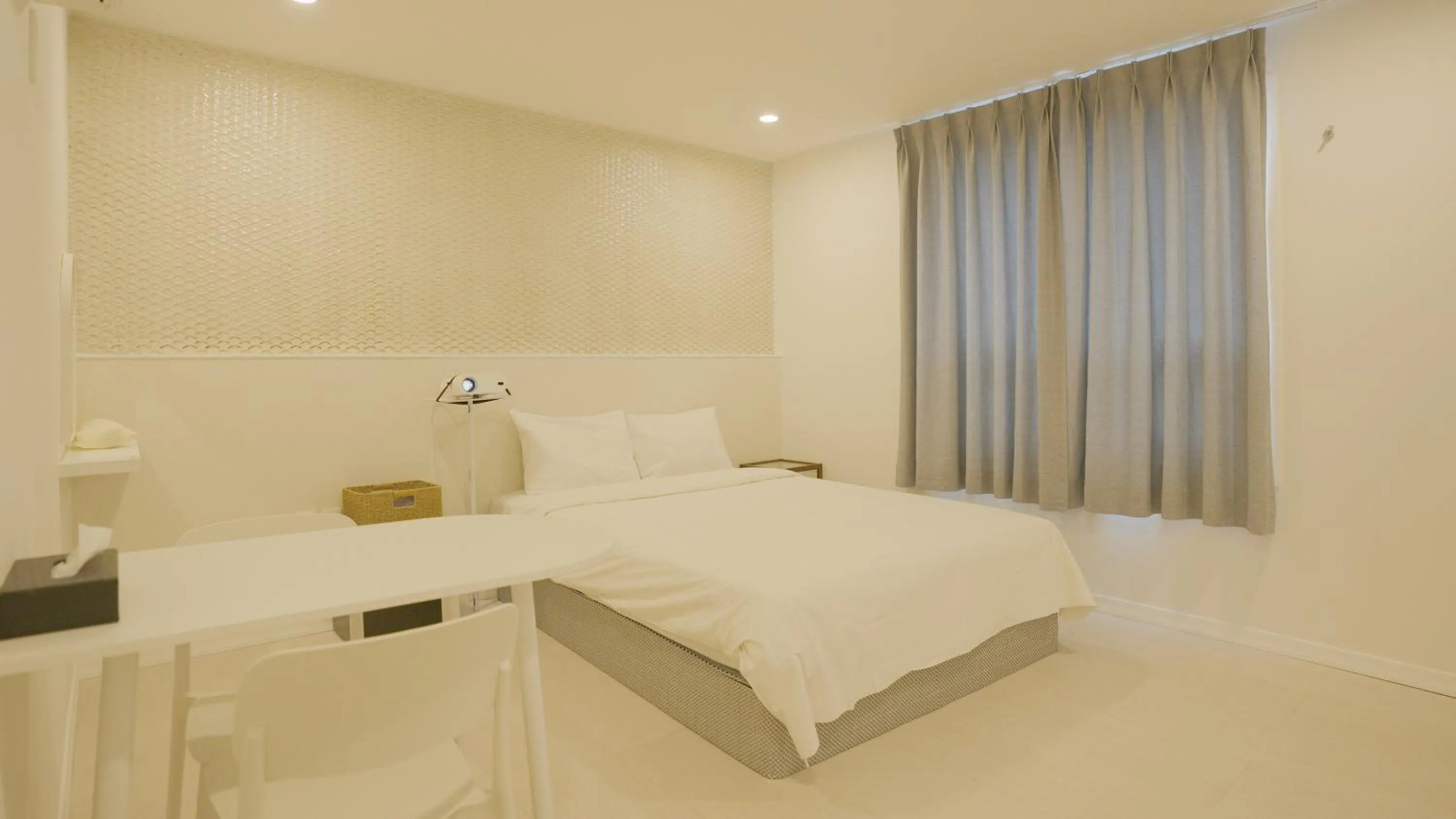 Bed in Jeju Stay Hotel